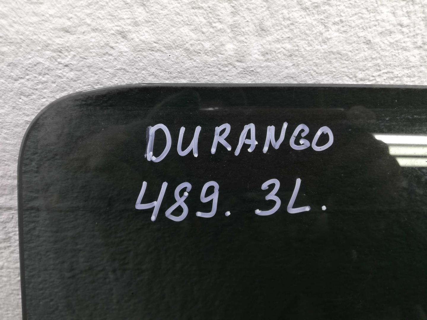 Стекло двери задней левой