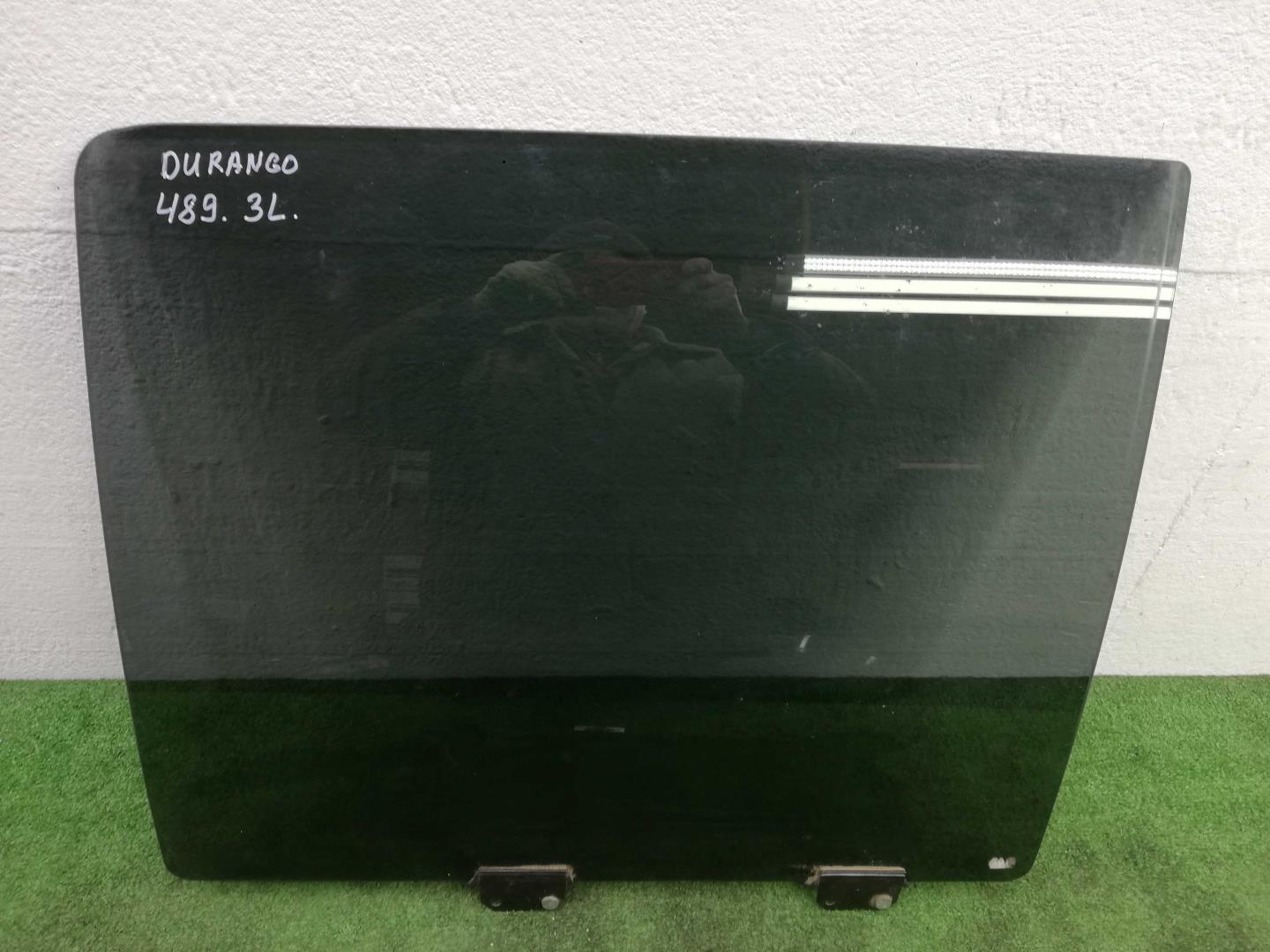 Стекло двери задней левой