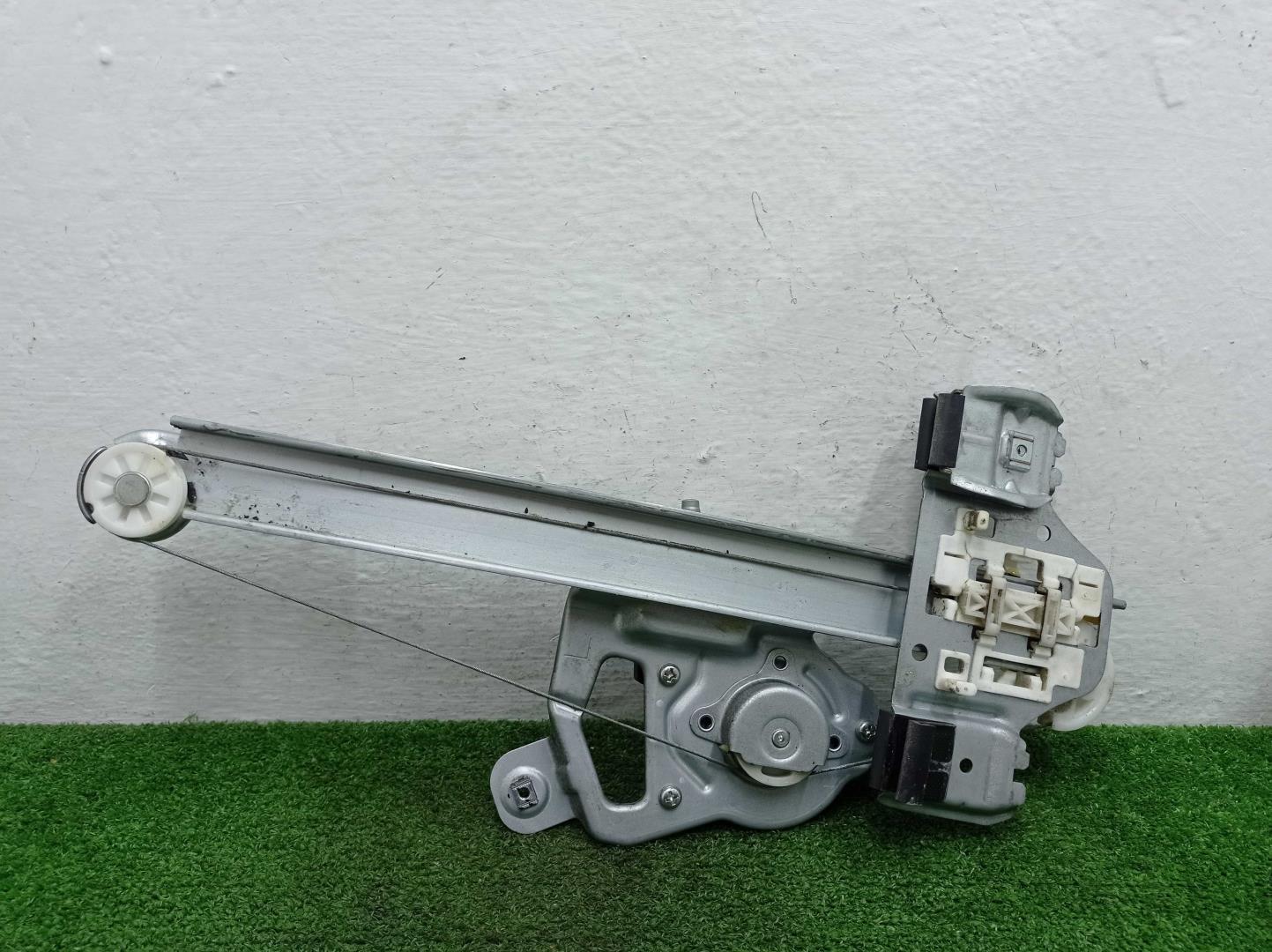 Стеклоподъемник электр. задний левый