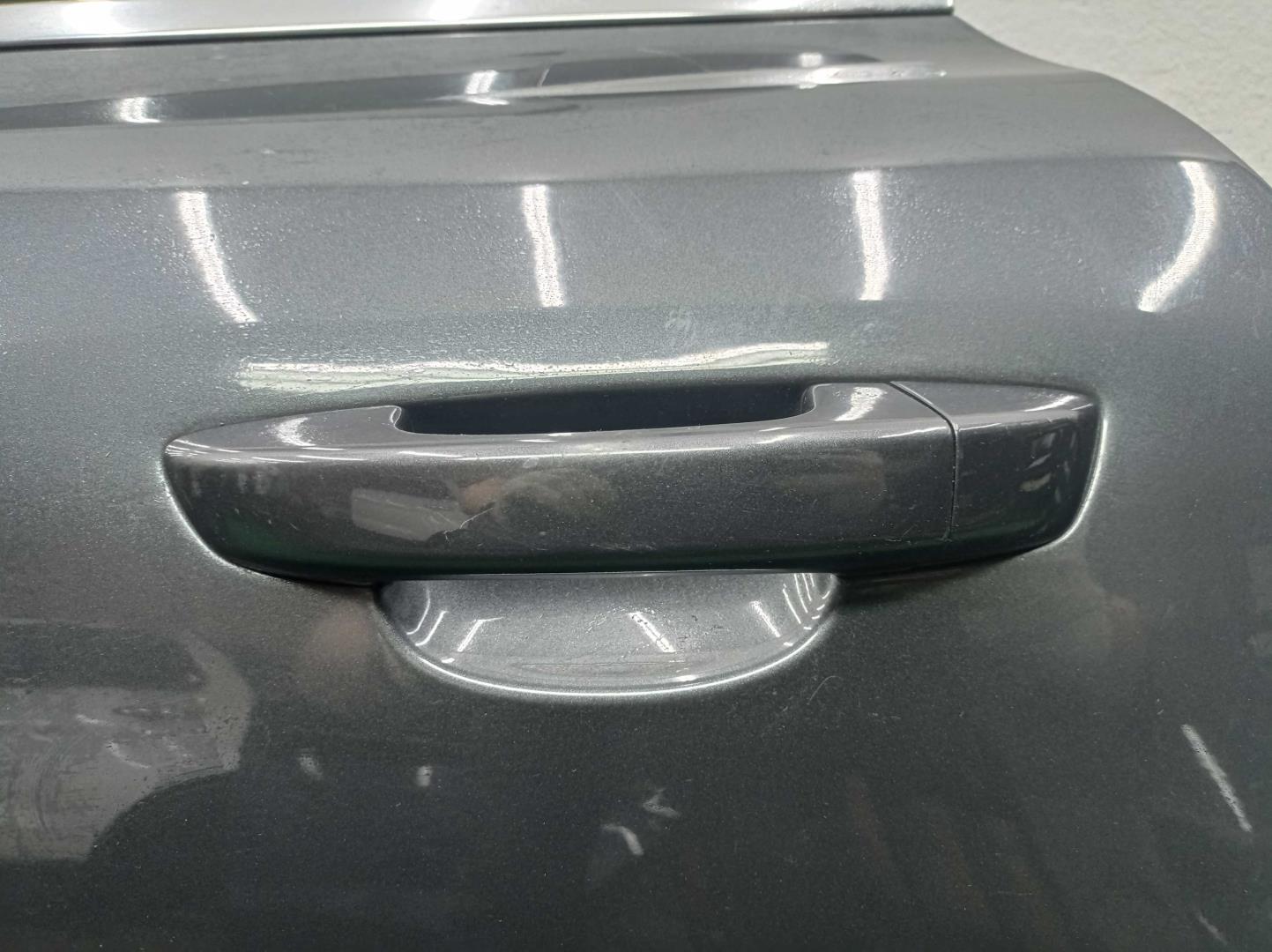 Стекло двери задней левой