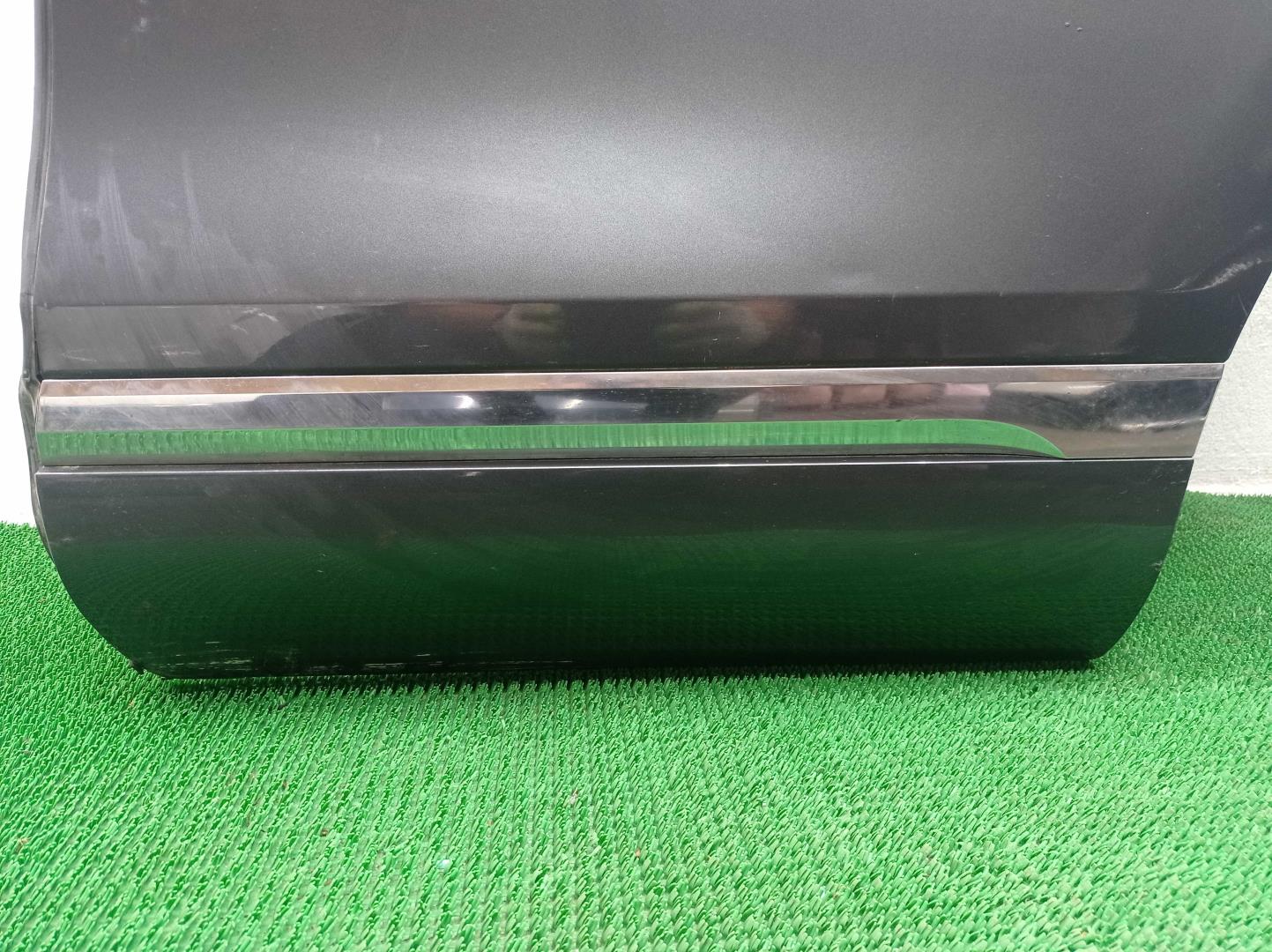 Стекло двери задней левой