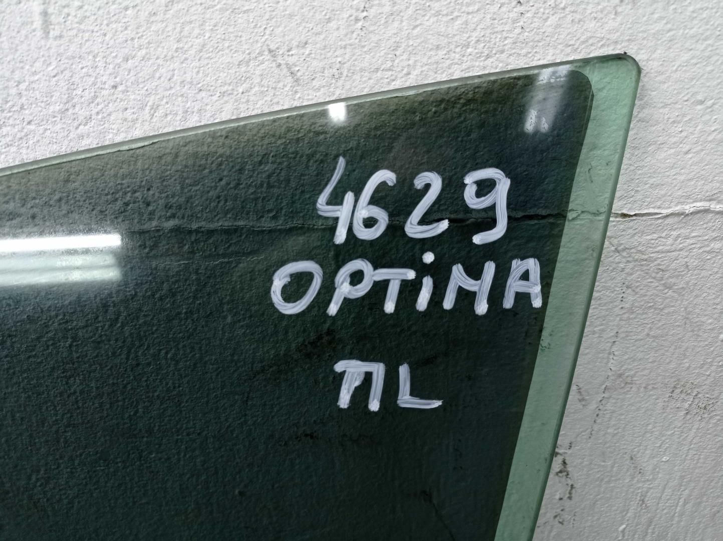 Стекло двери передней левой