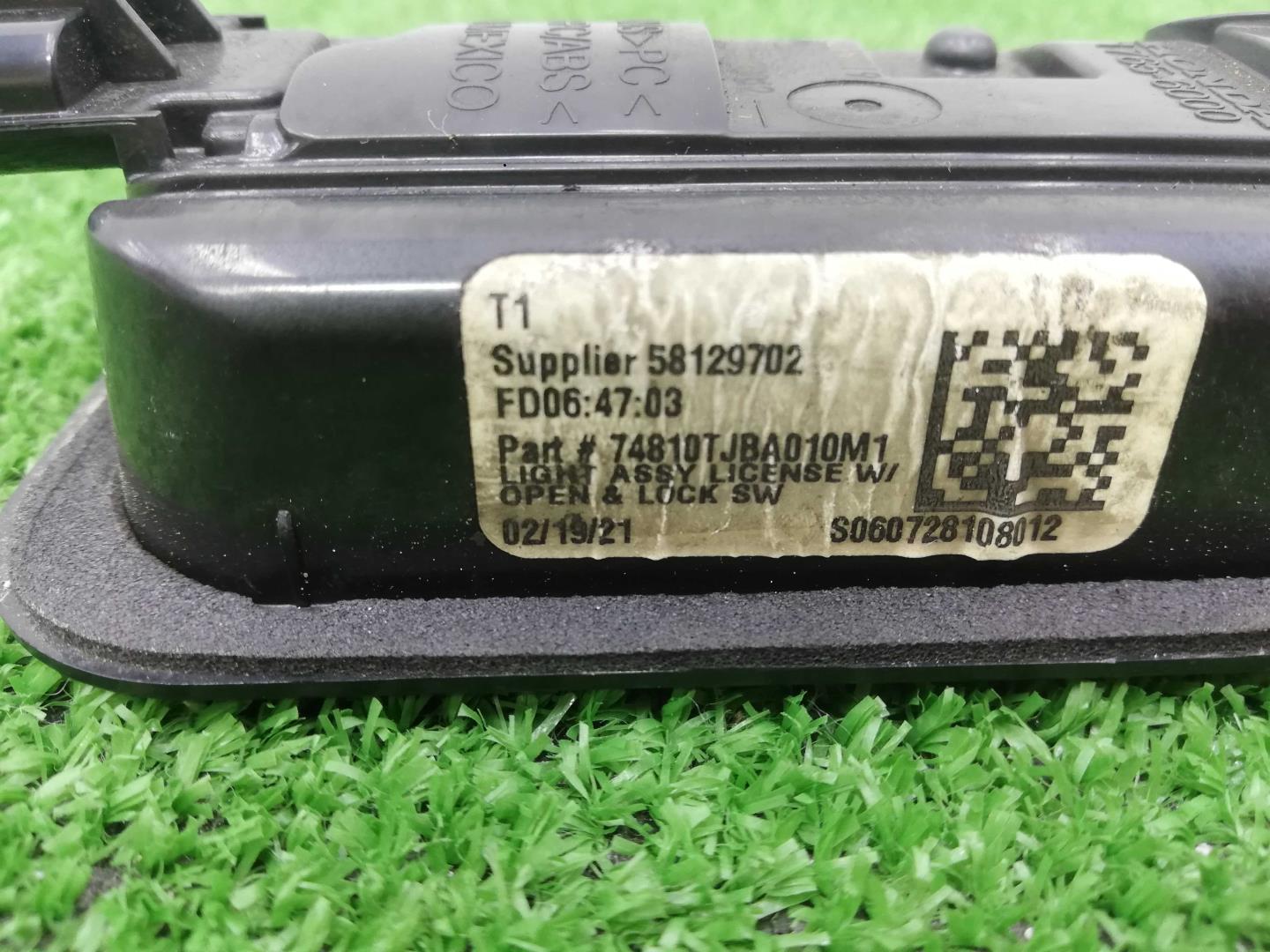 Фонарь подсветки номера