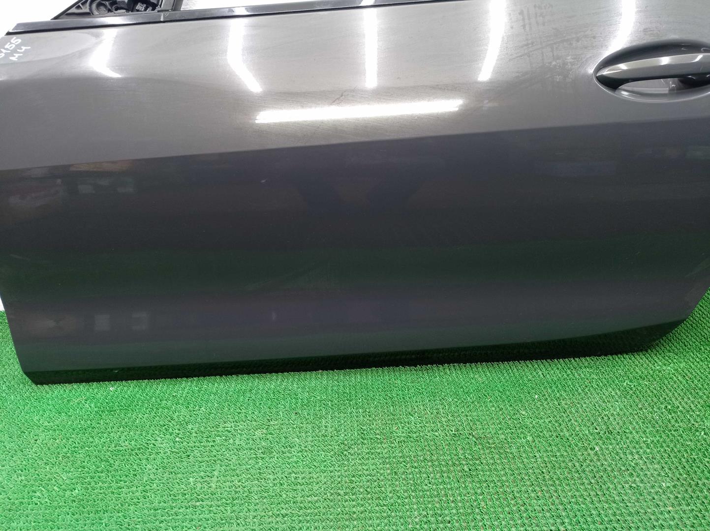 Обшивка двери передней левой