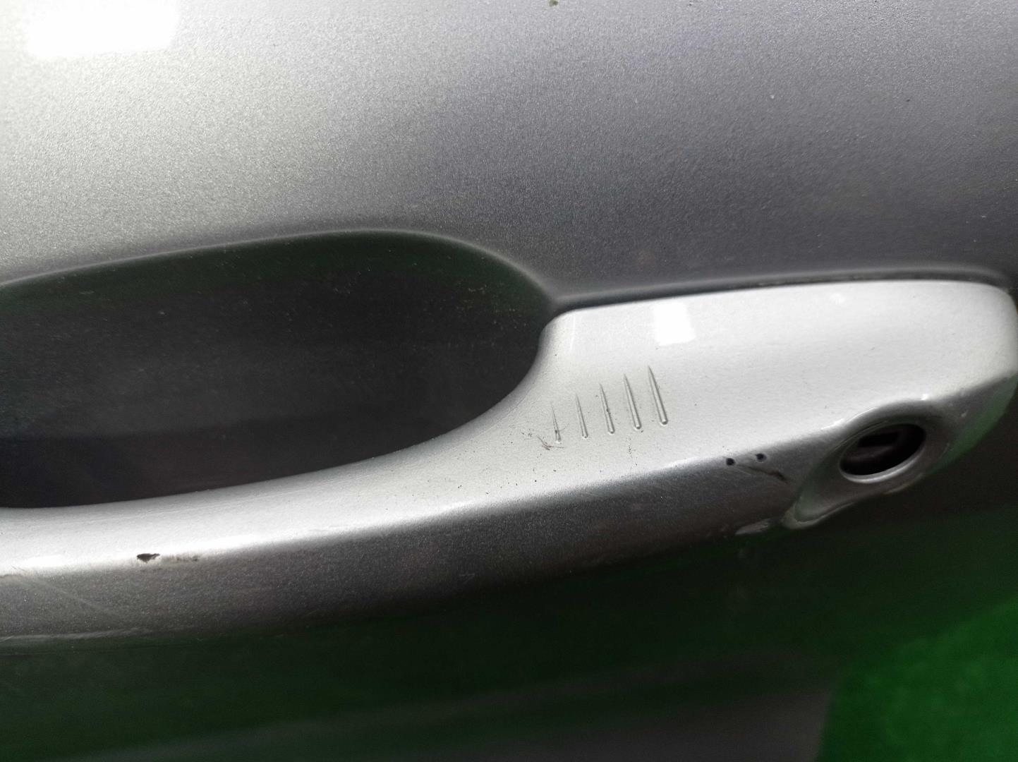 Ручка двери передней наружная левая