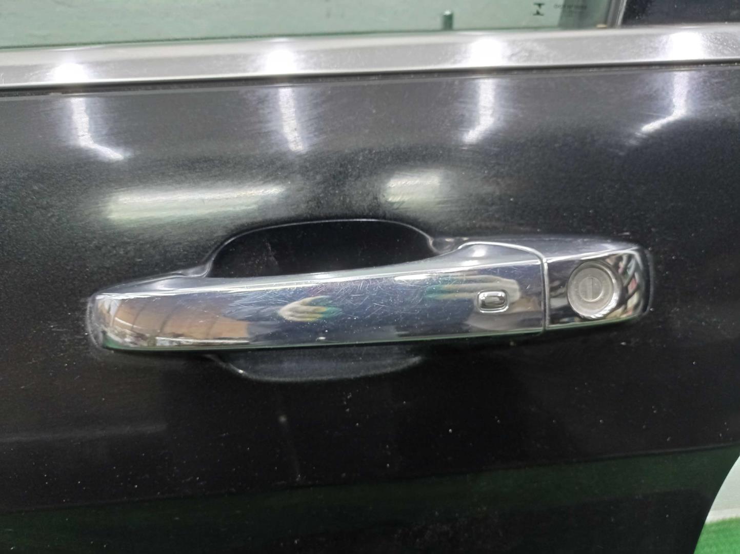 Замок двери передней левой