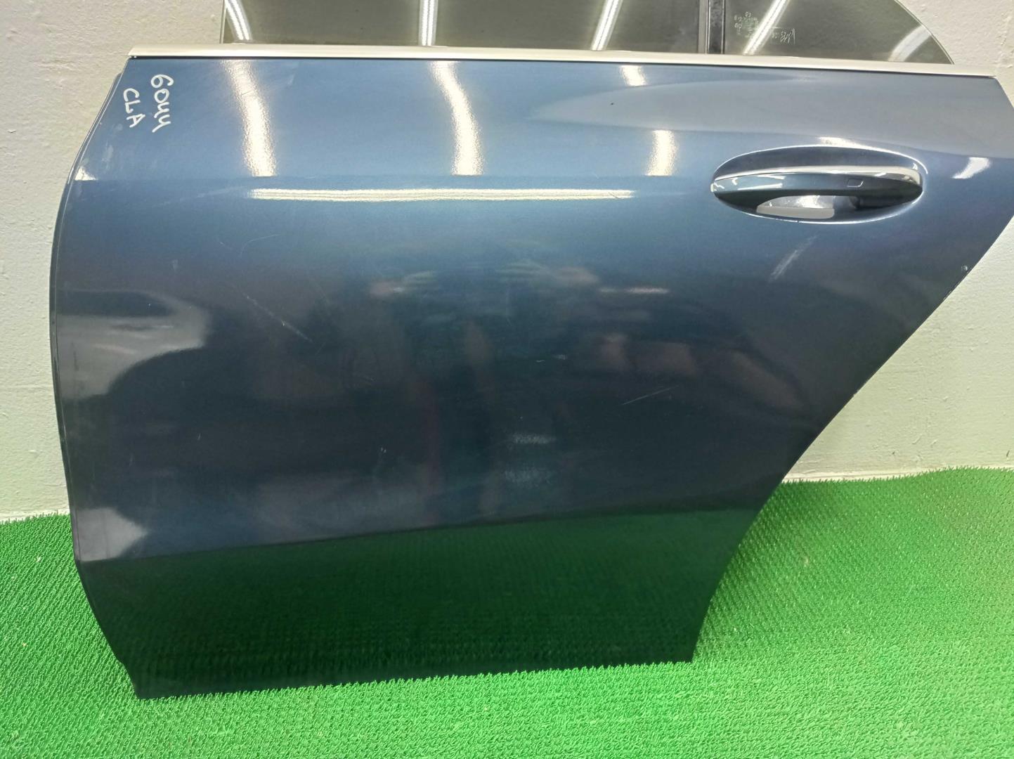 Стекло двери задней левой