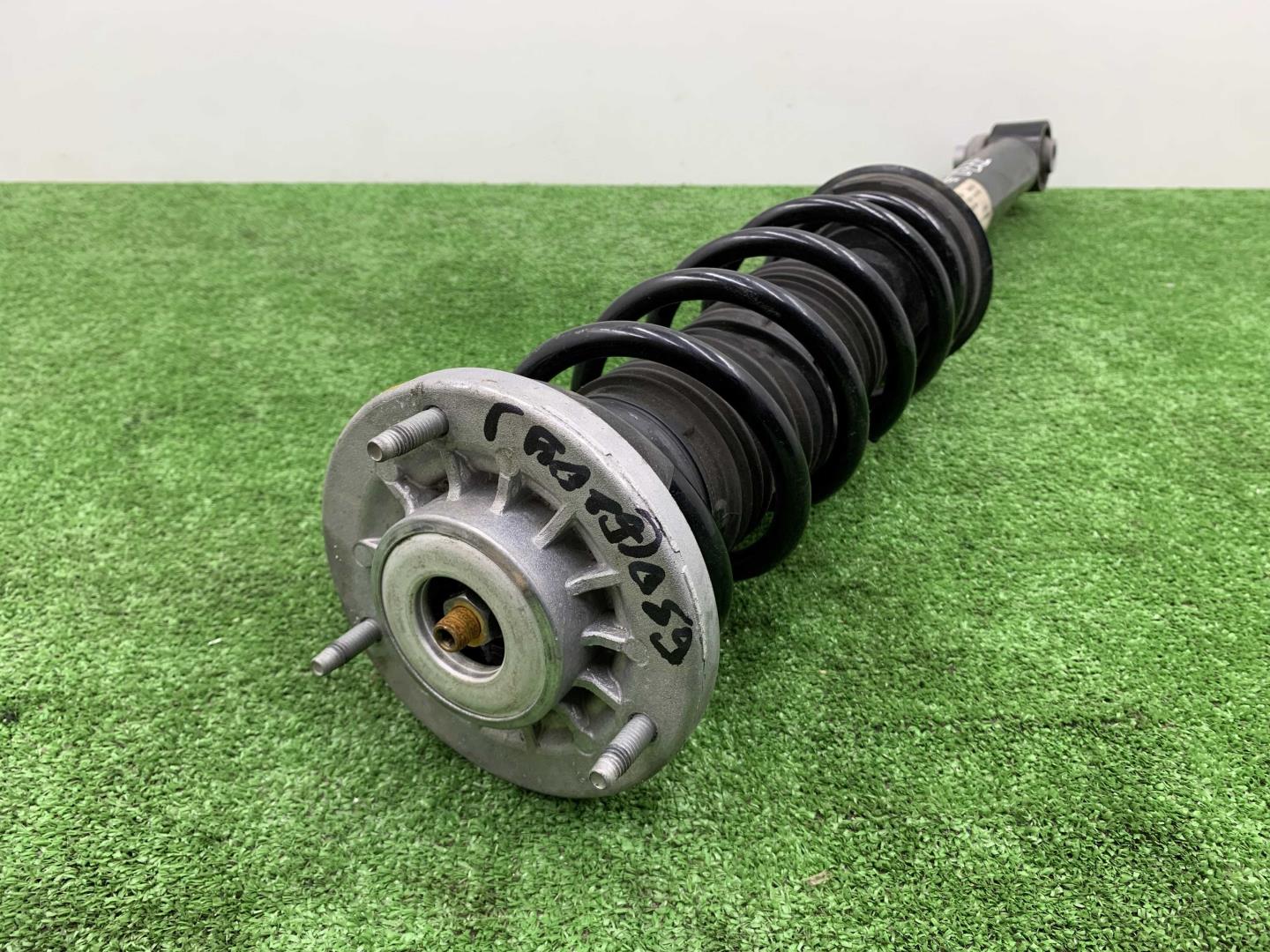 Амортизатор задний левый