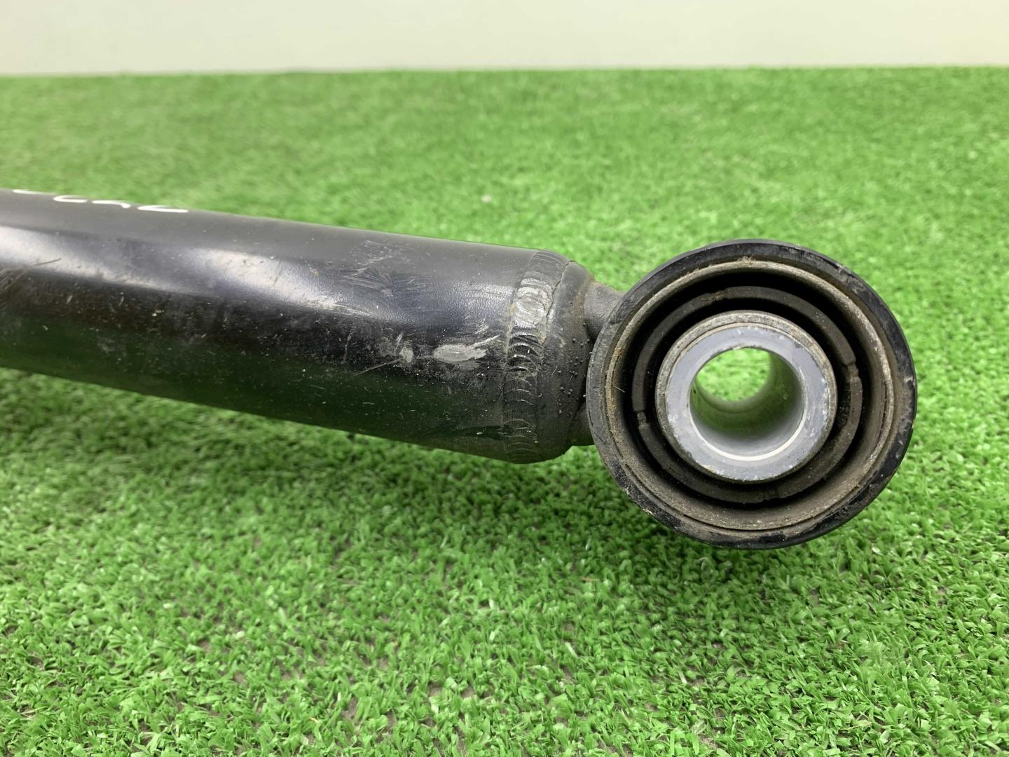 Амортизатор задний левый