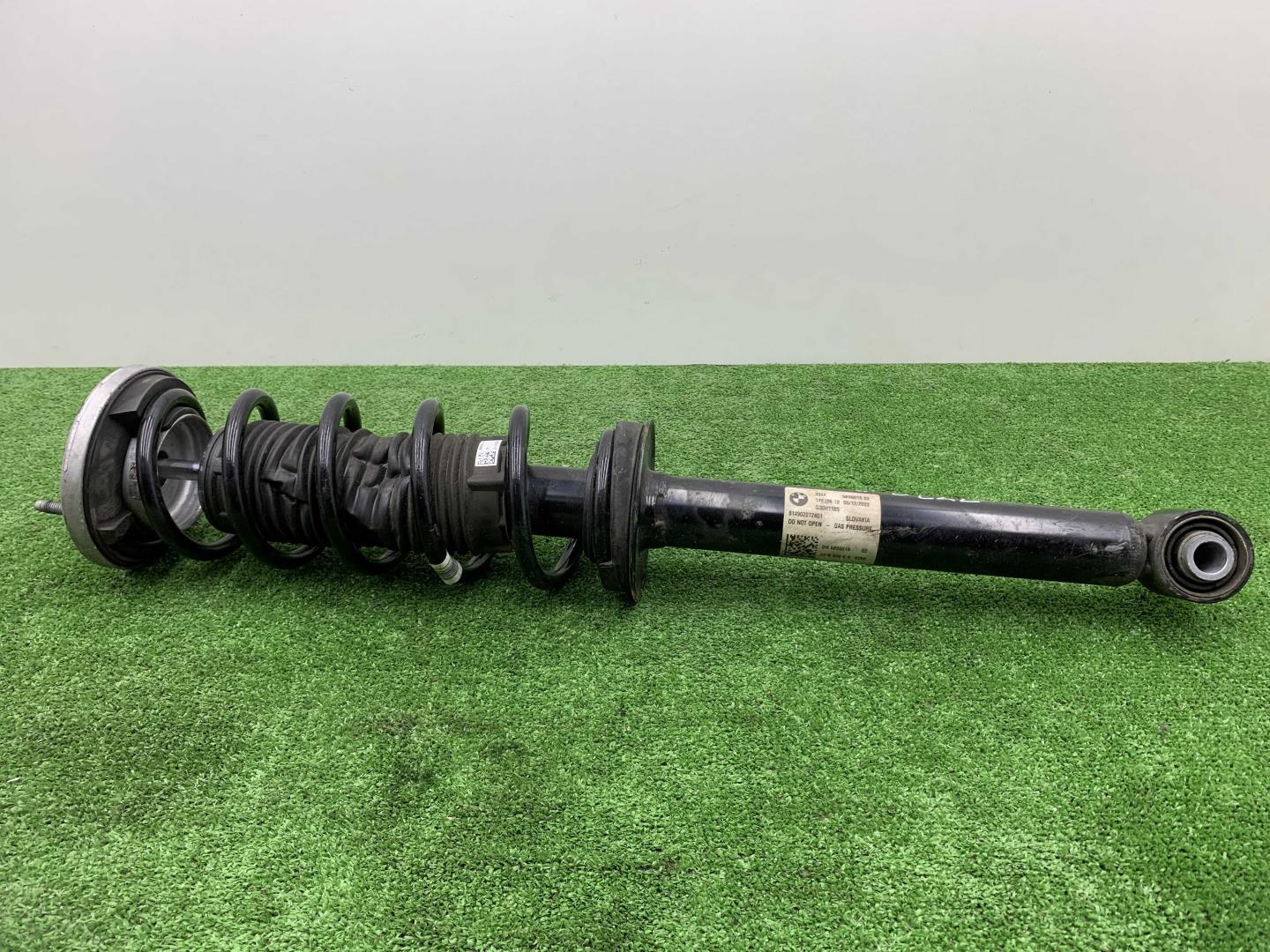 Амортизатор задний левый