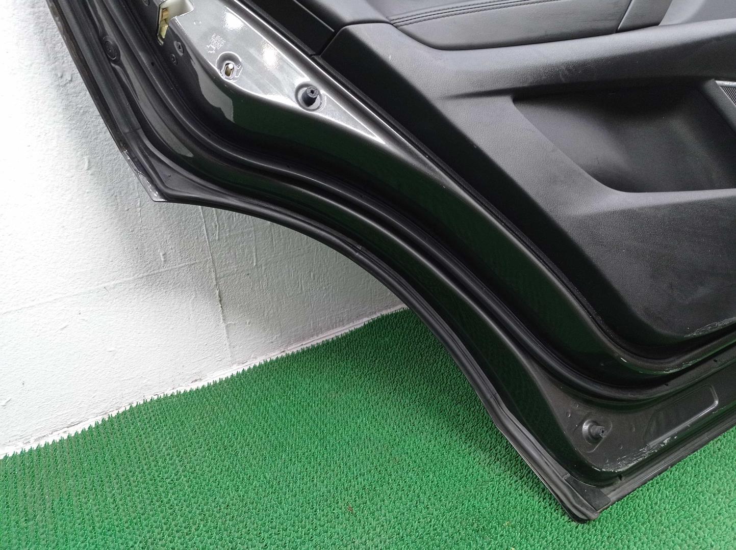 Стекло двери задней левой