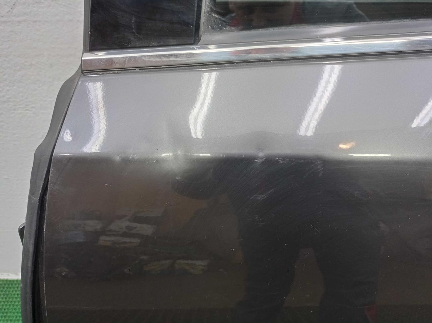 Стекло двери задней левой