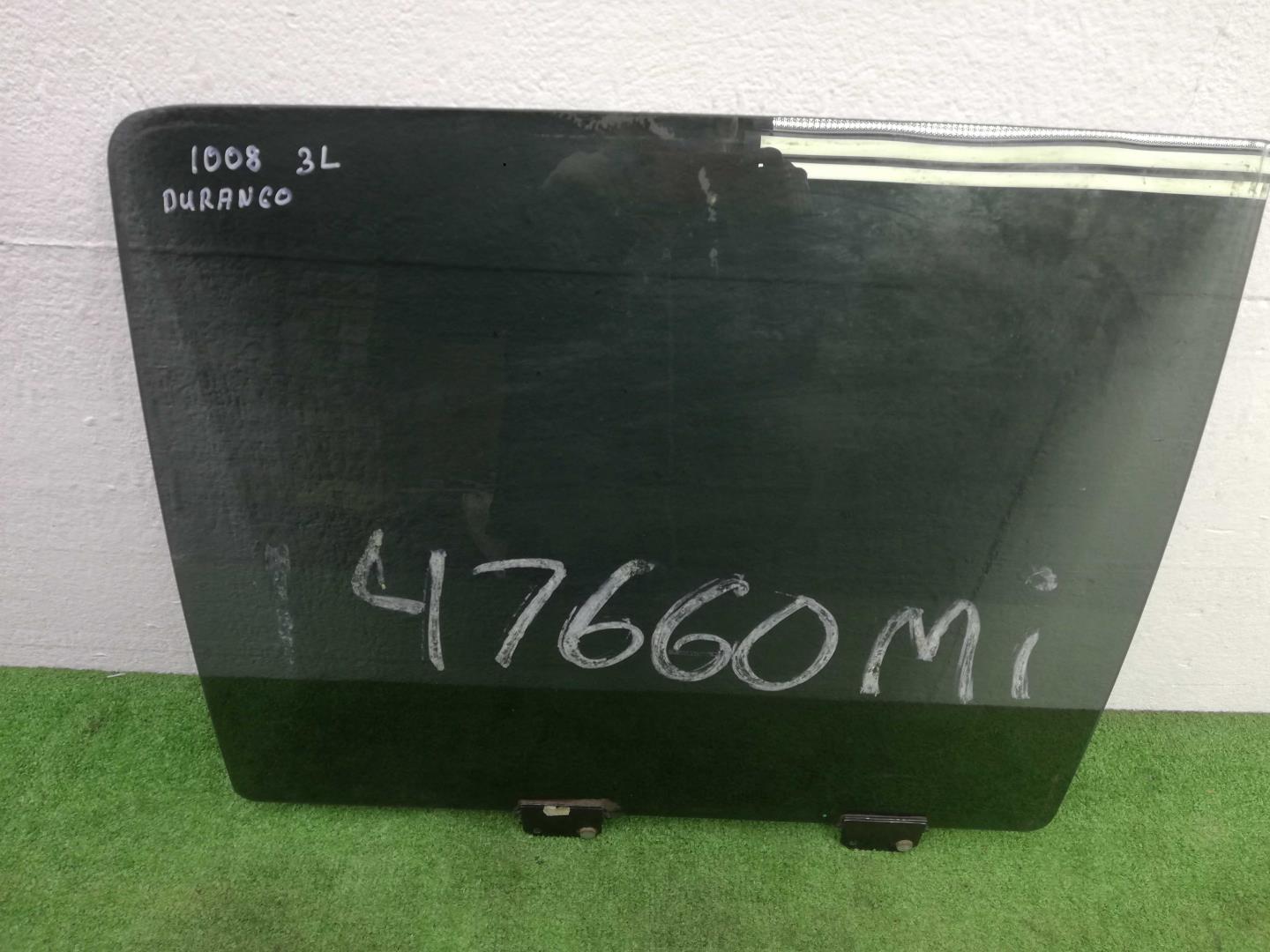 Стекло двери задней левой