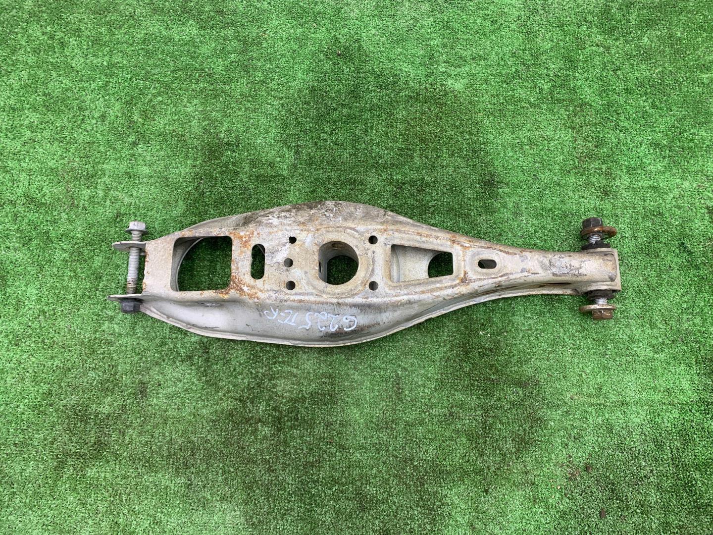 Рычаг задний левый