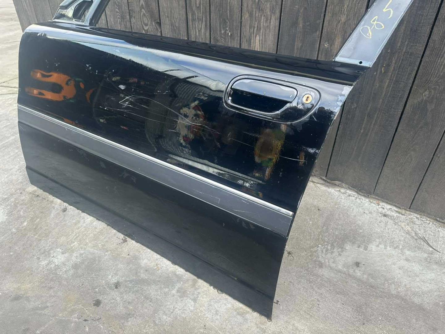 Дверь передняя левая