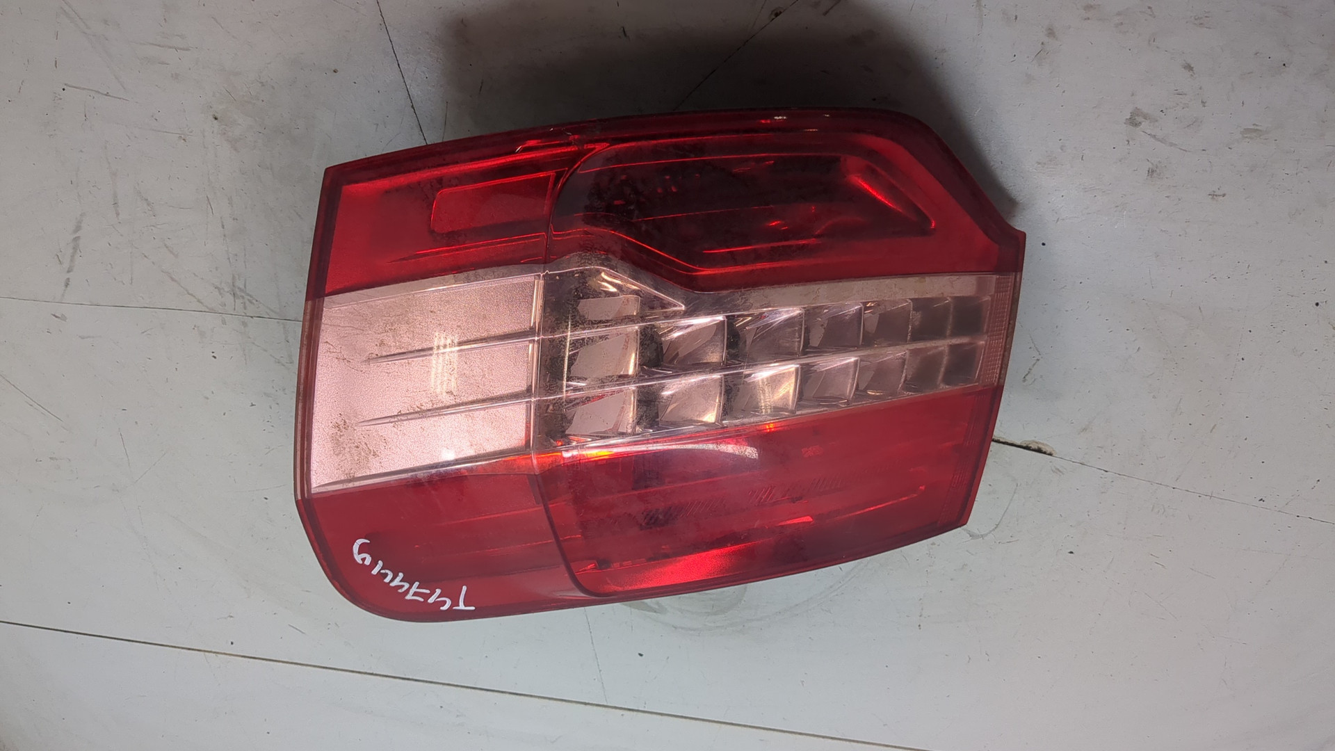 Фонарь задний левый