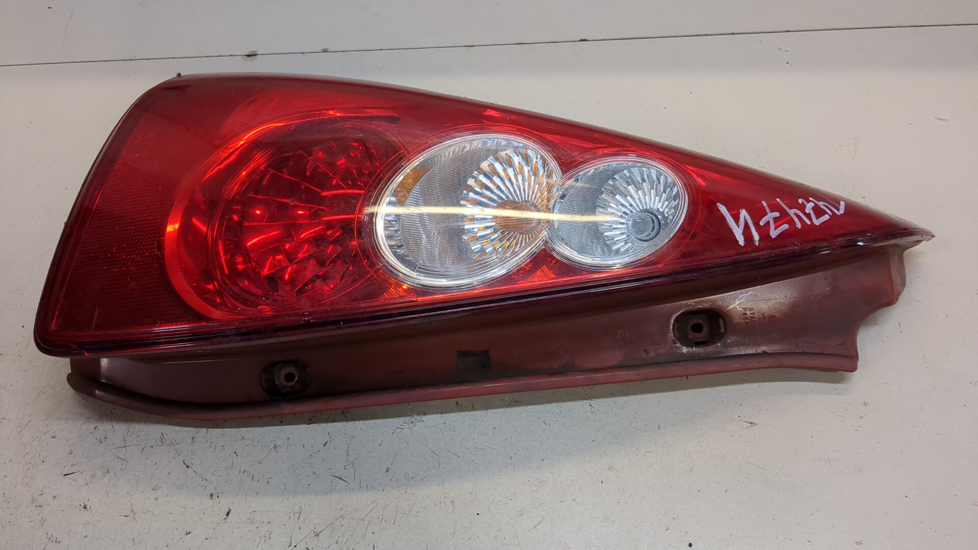 Фонарь задний левый