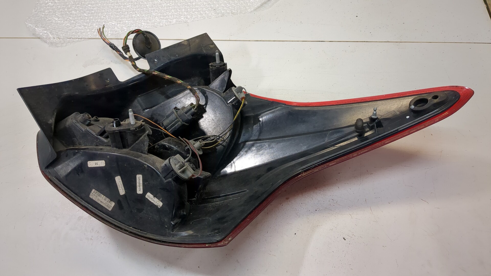 Фонарь задний левый