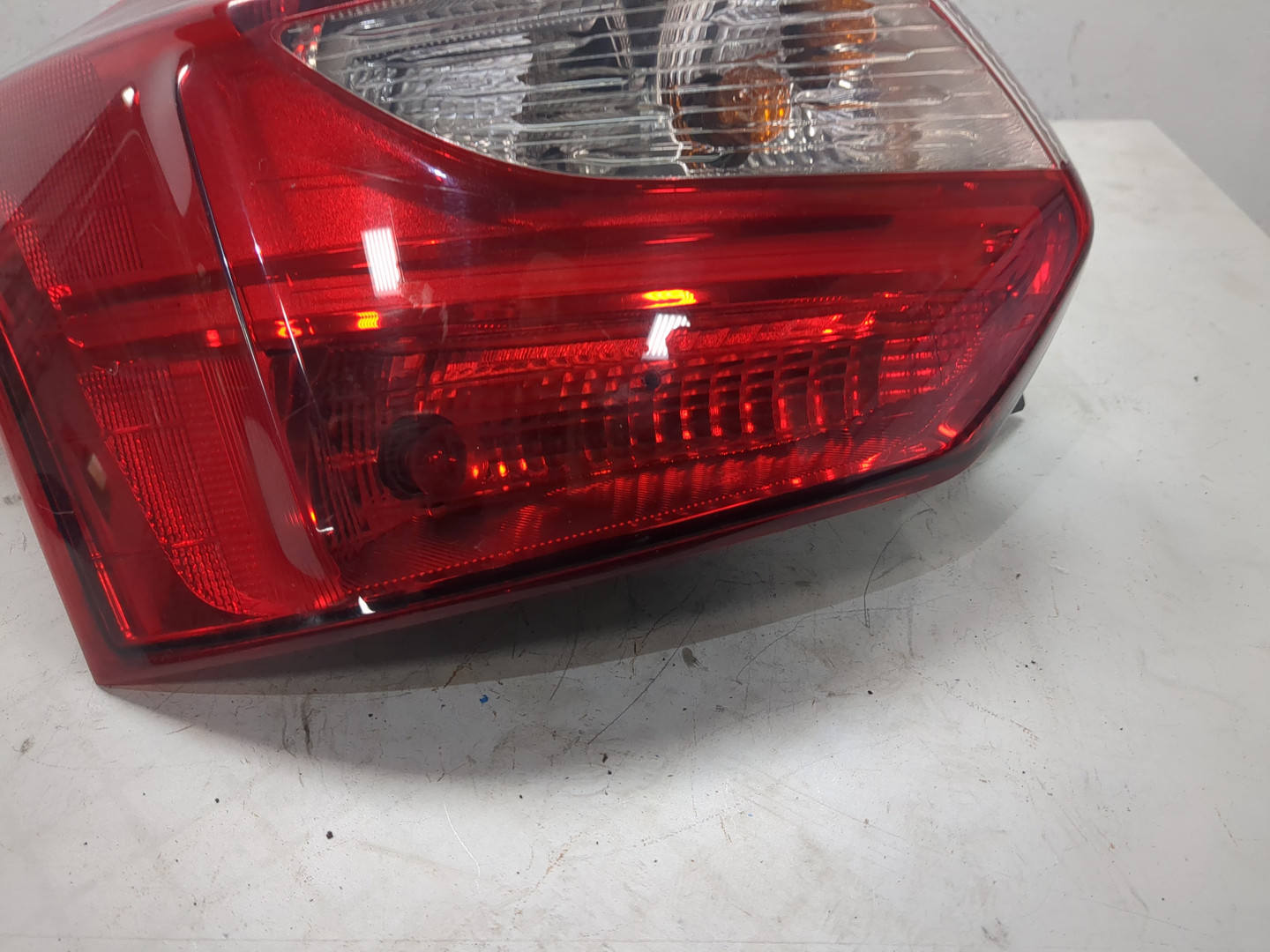 Фонарь задний левый