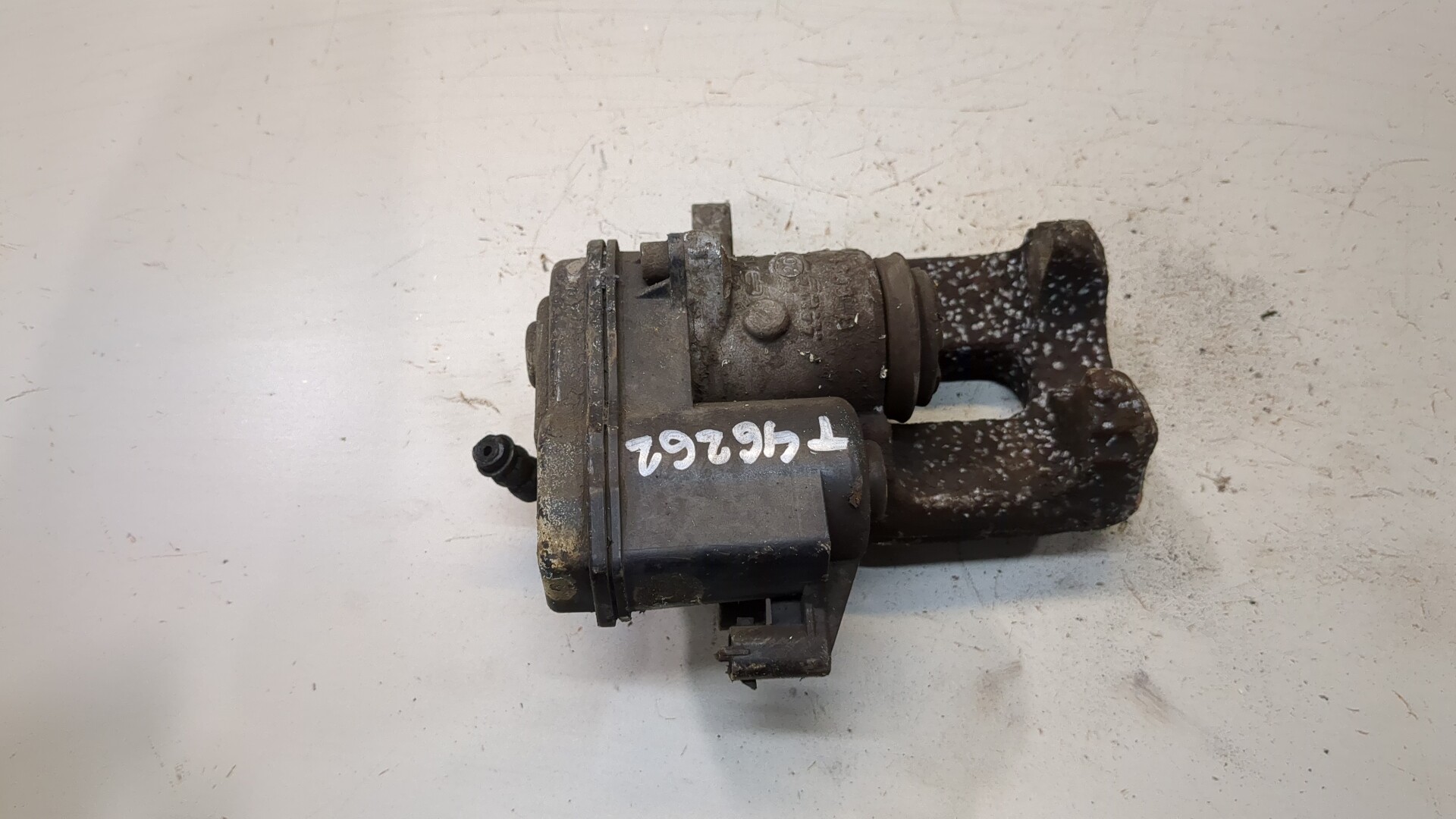 Суппорт задний левый