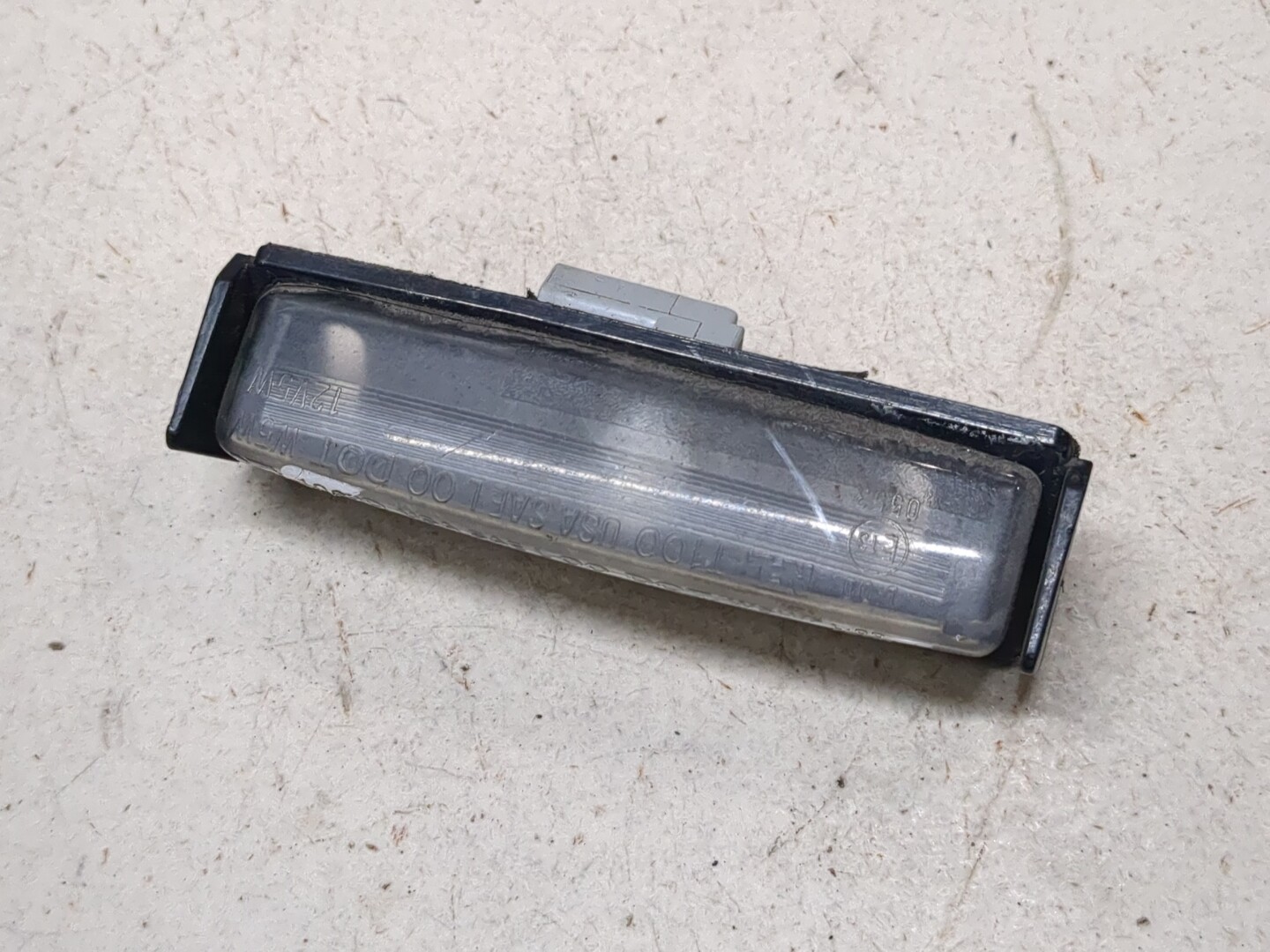 Фонарь подсветки номера