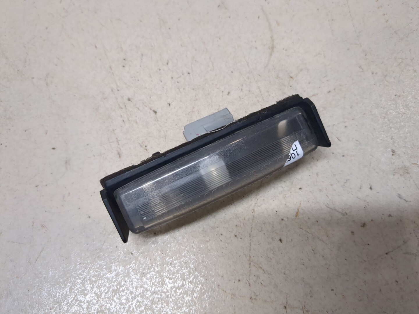 Фонарь подсветки номера