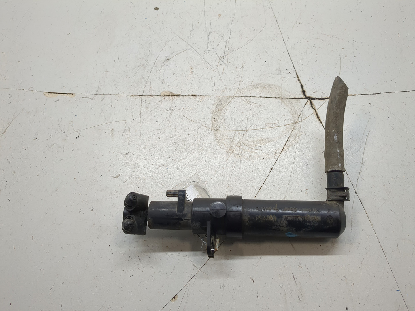 Форсунка омывателя фары