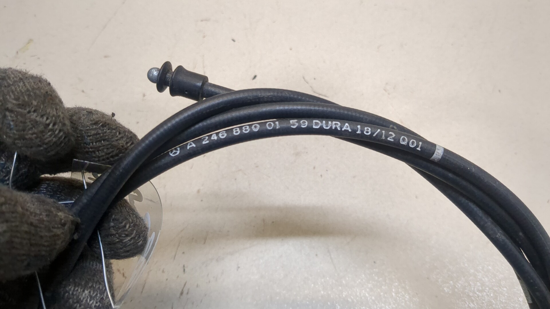 Трос открывания капота