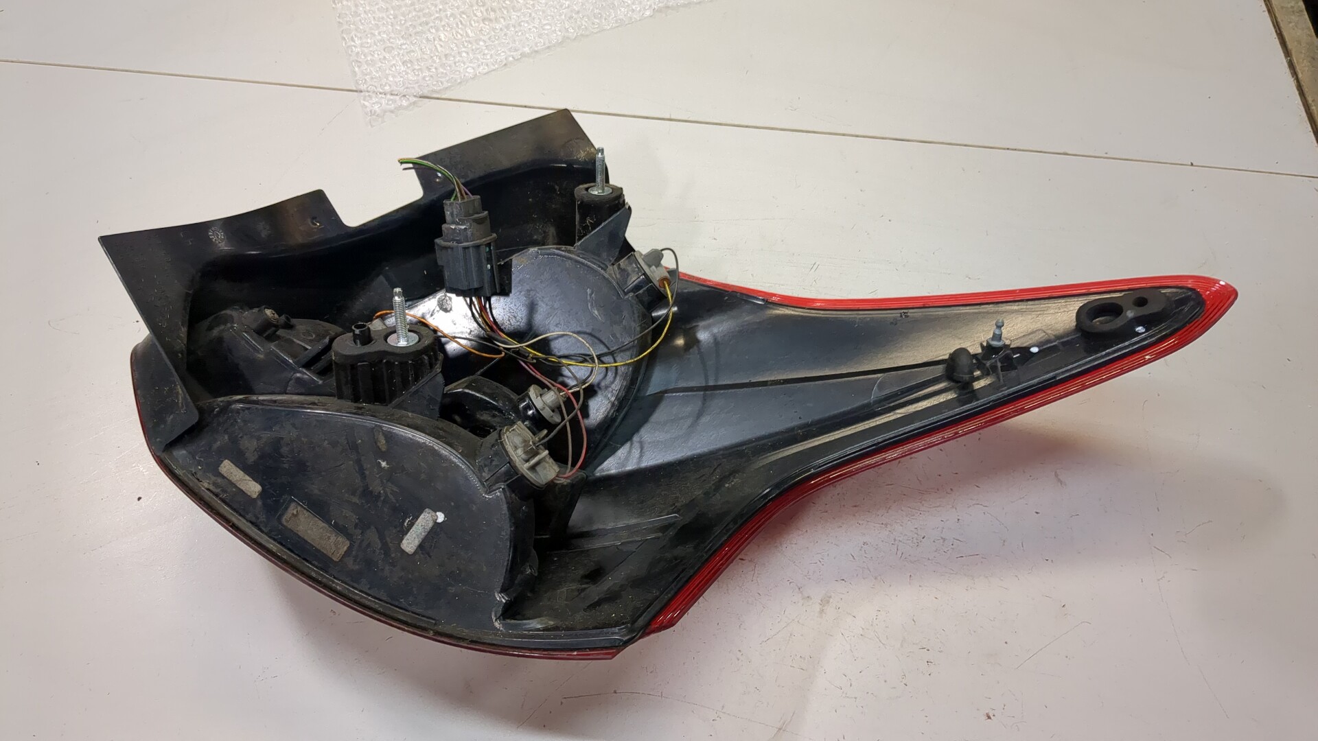 Фонарь задний левый