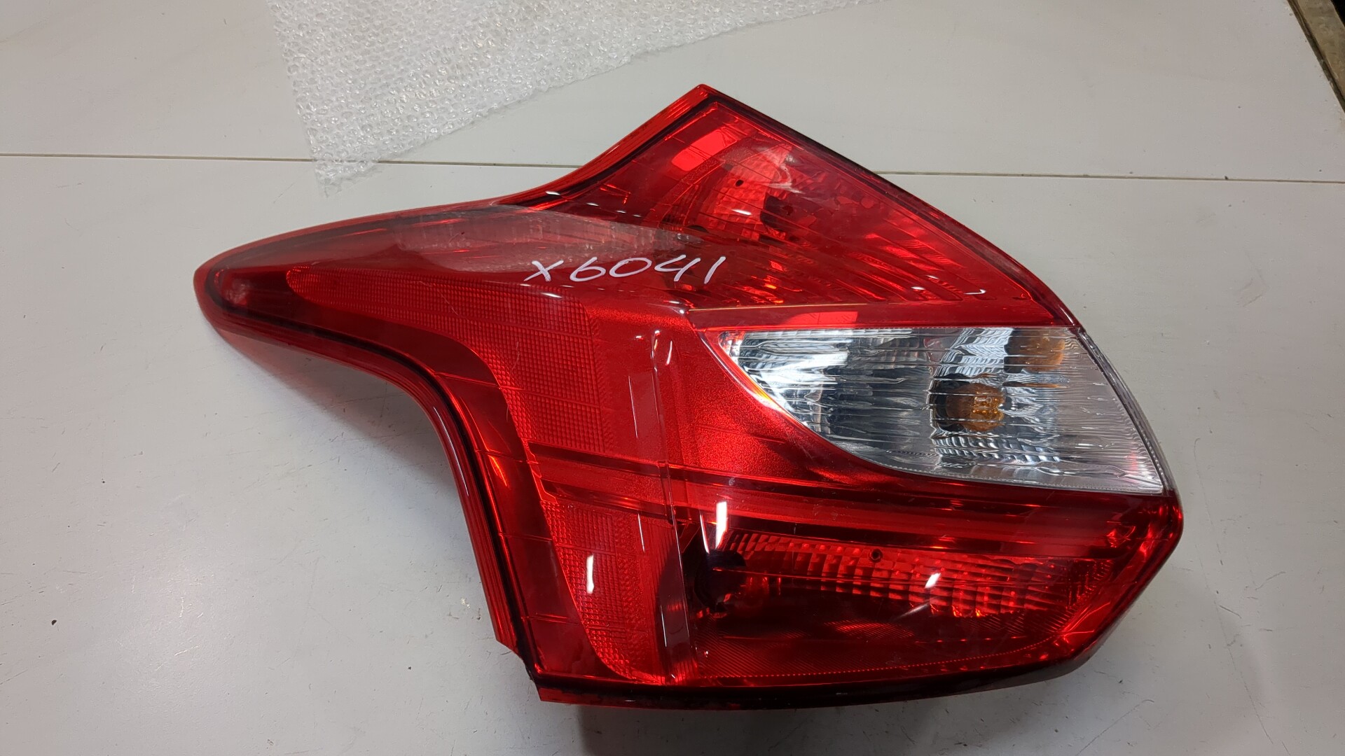 Фонарь задний левый