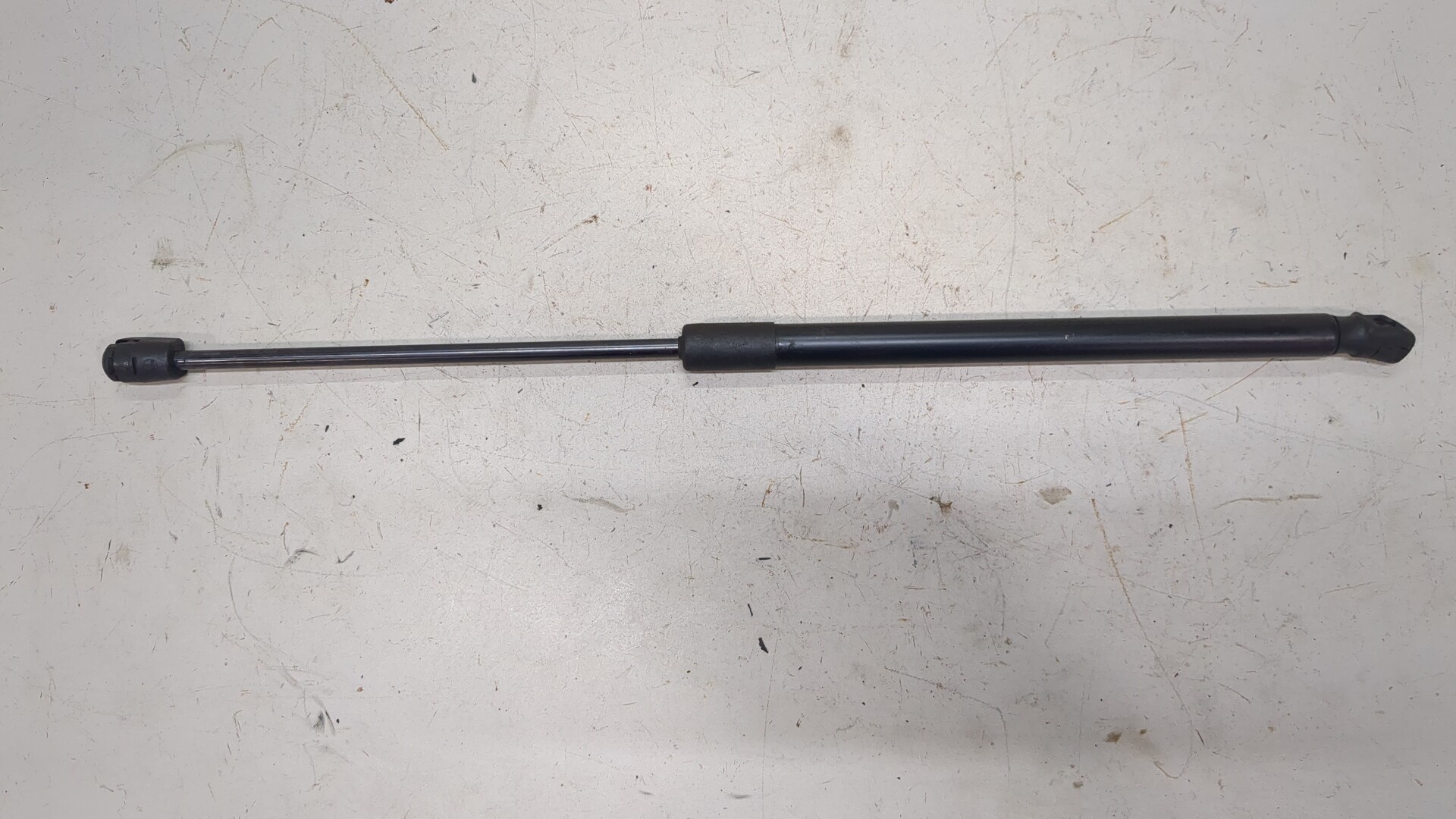 Амортизатор капота