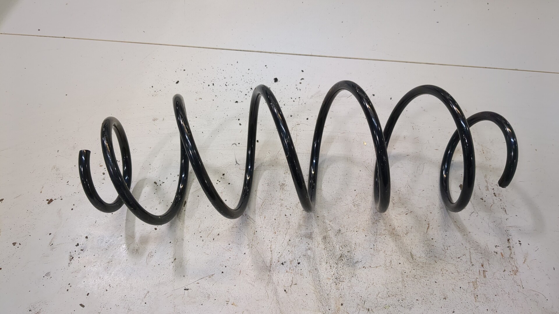 Пружина задняя