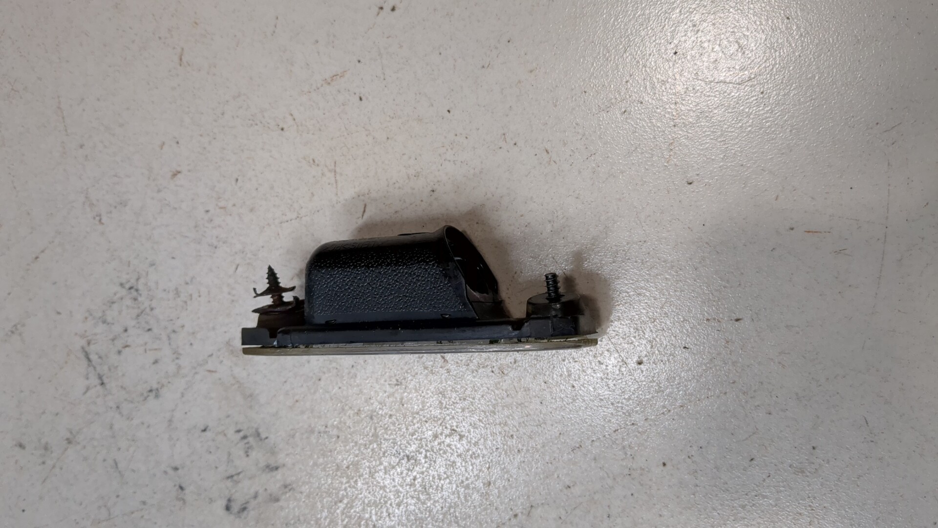 Фонарь подсветки номера