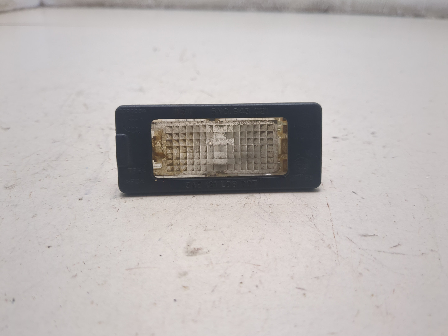 Фонарь подсветки номера