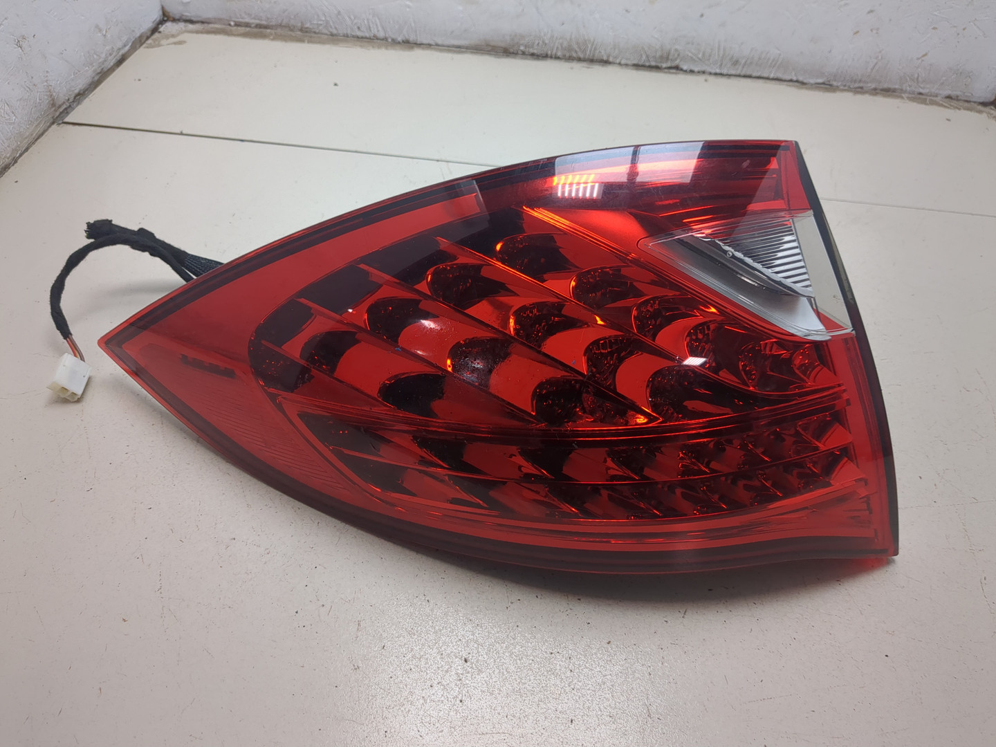 Фонарь задний левый