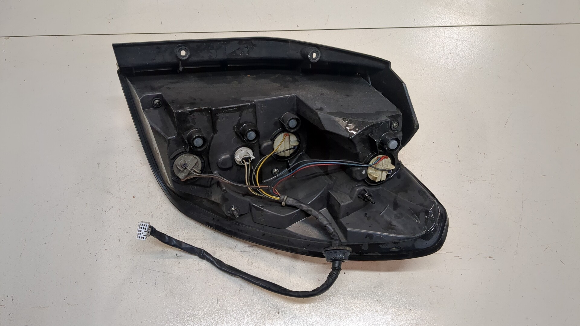 Фонарь задний левый