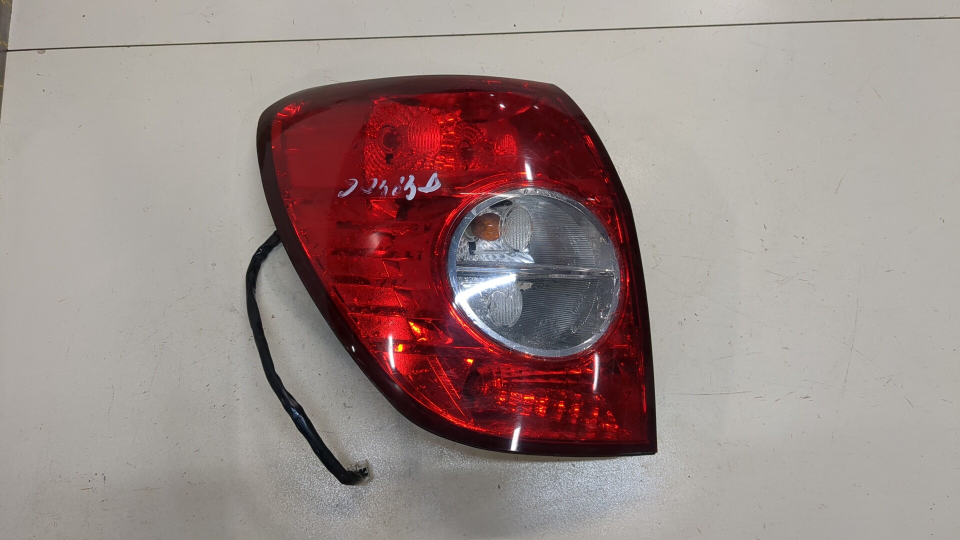 Фонарь задний левый