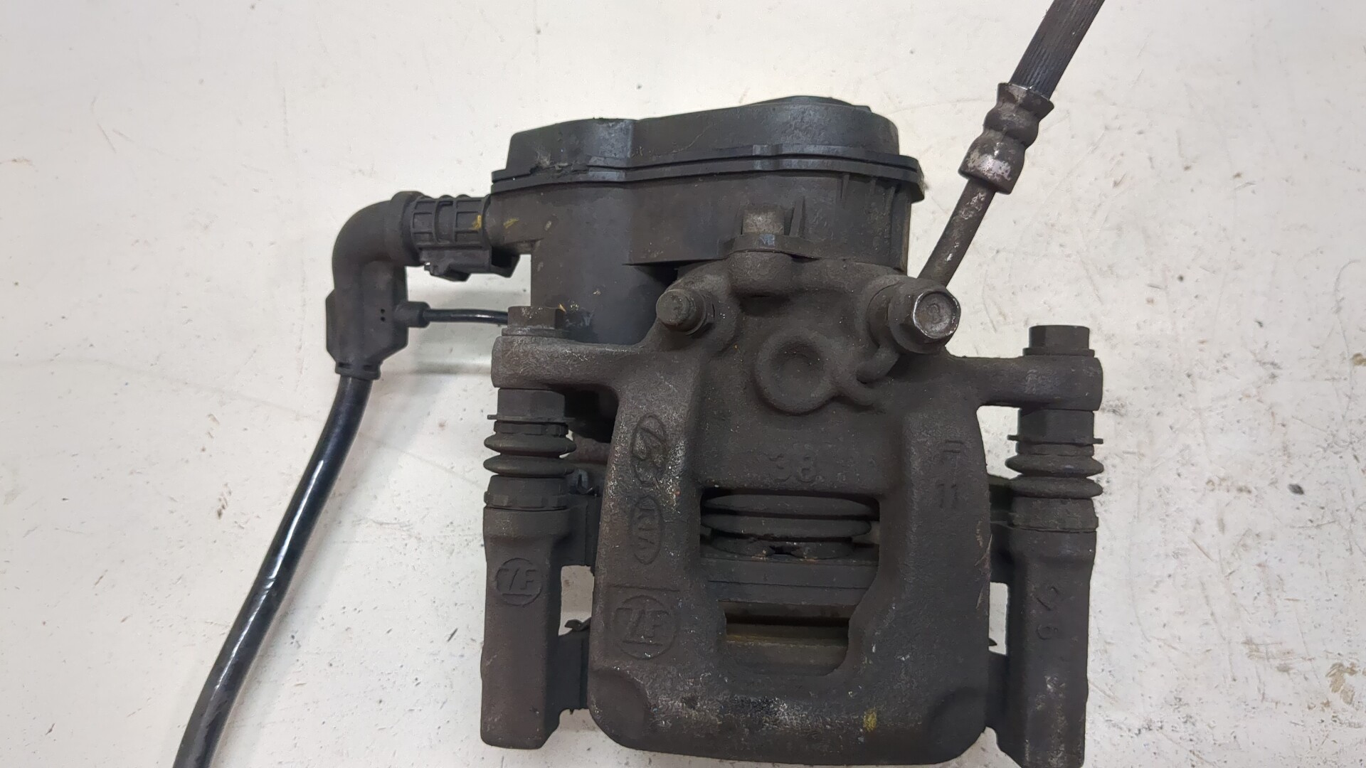 Суппорт задний левый