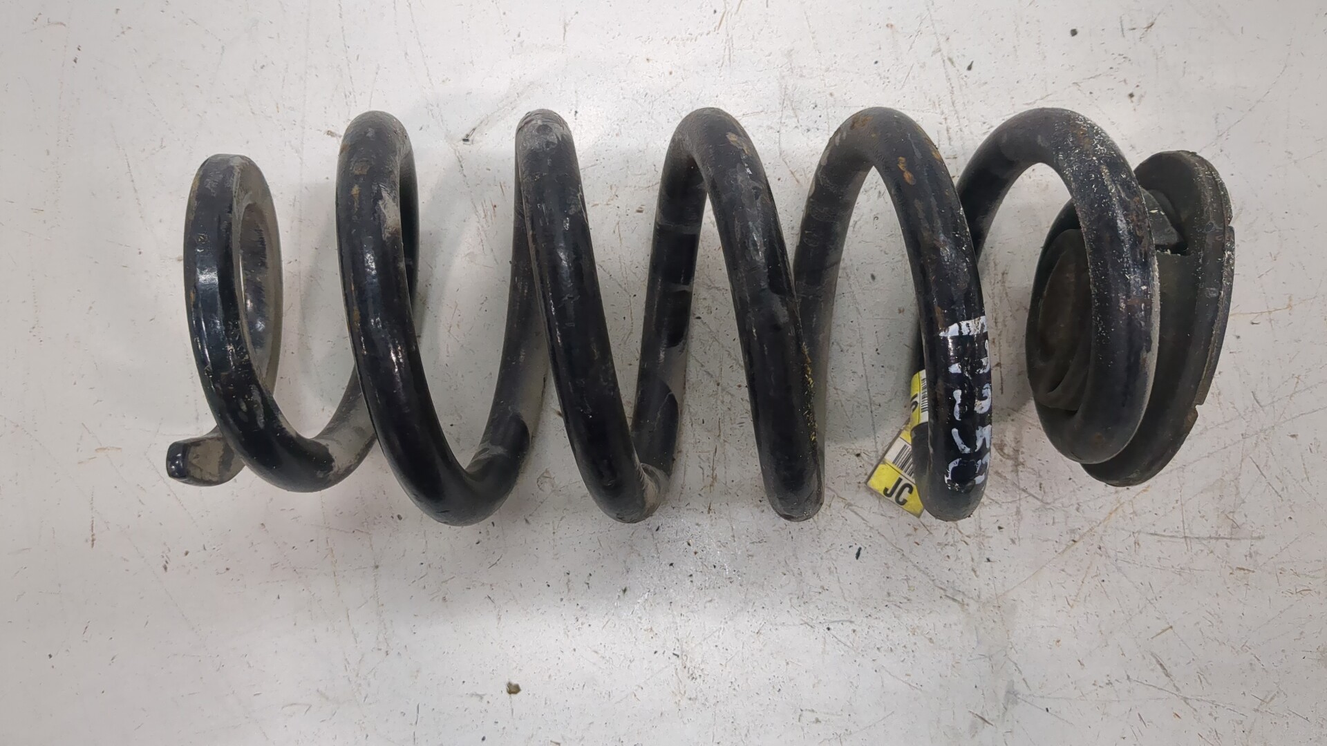 Пружина задняя