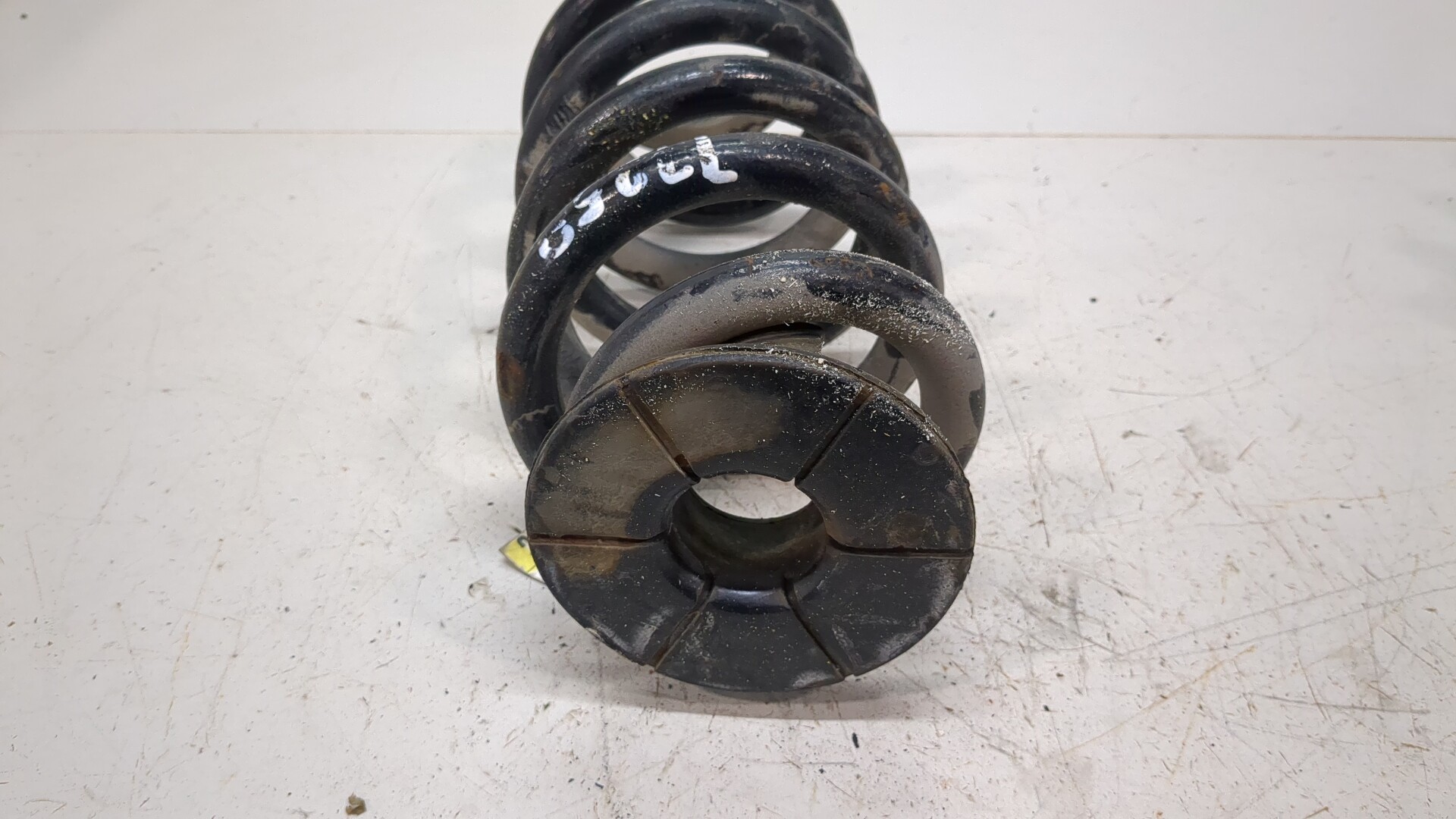 Пружина задняя