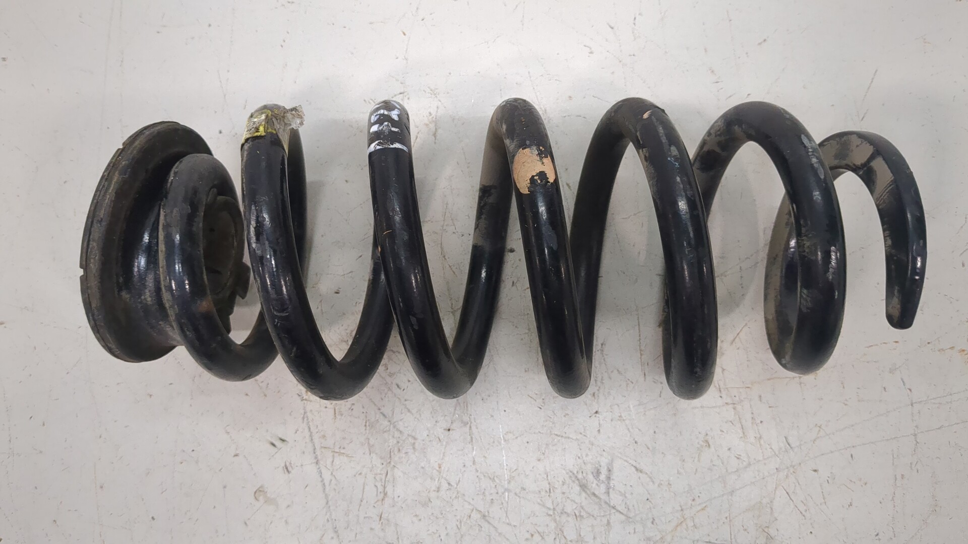 Пружина задняя