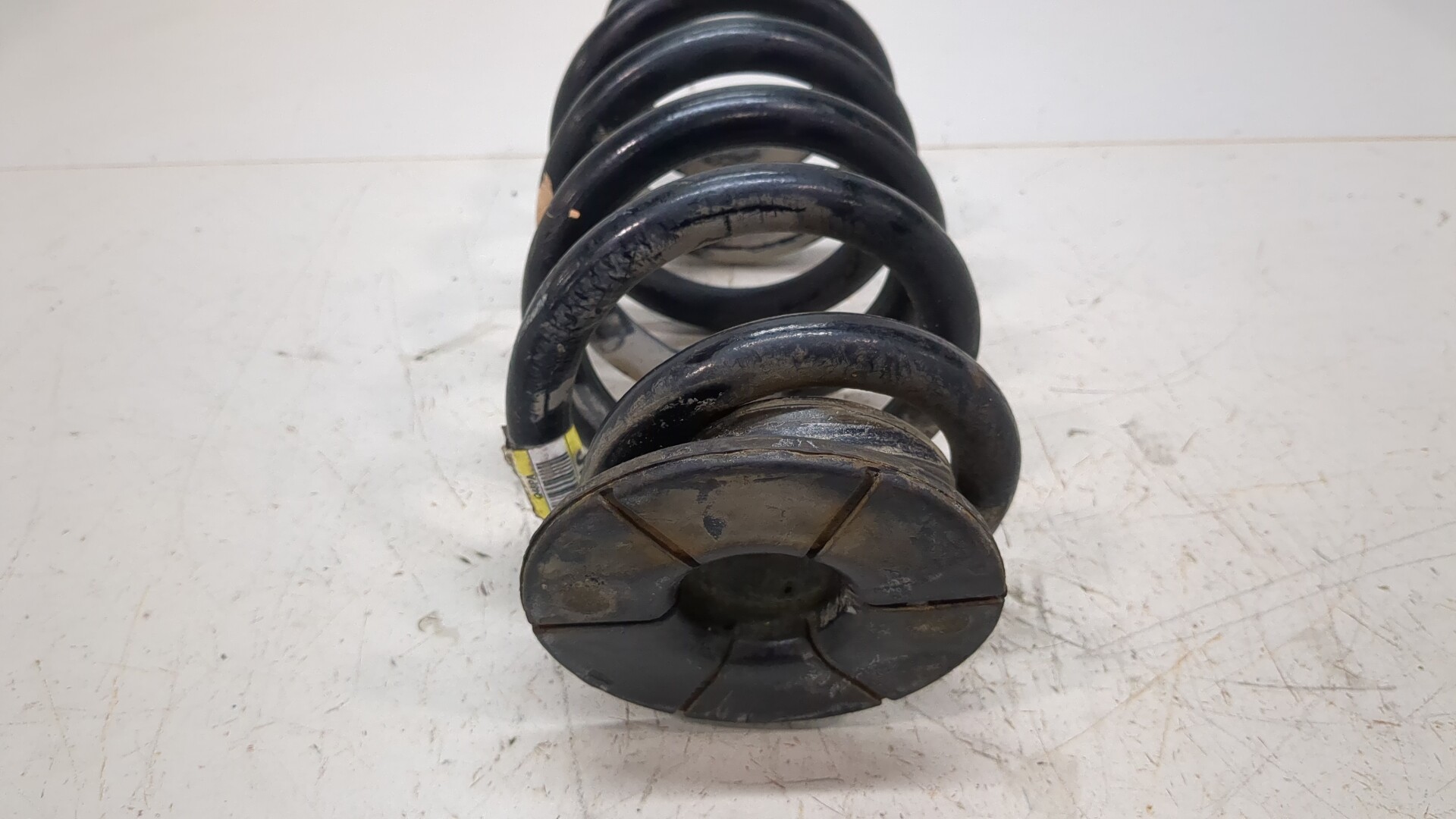 Пружина задняя