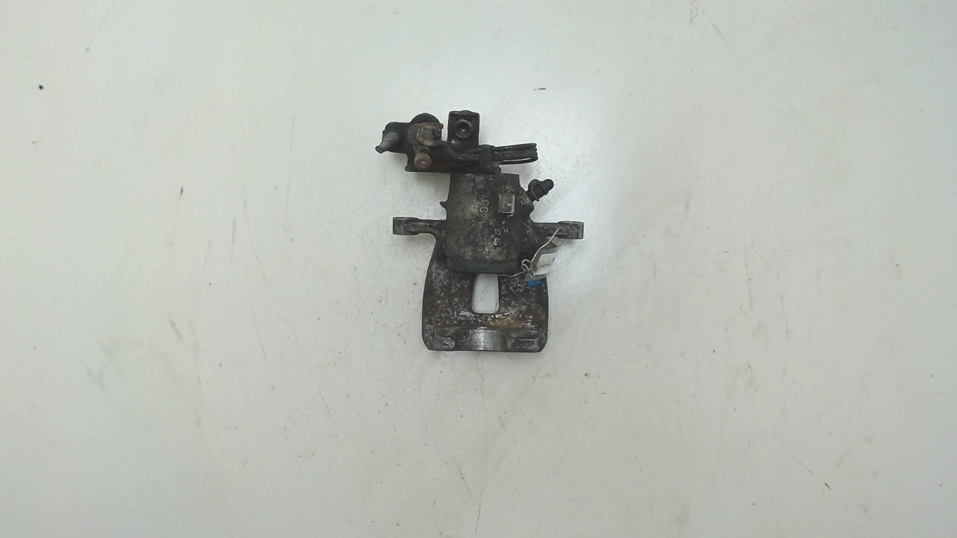 Суппорт задний левый