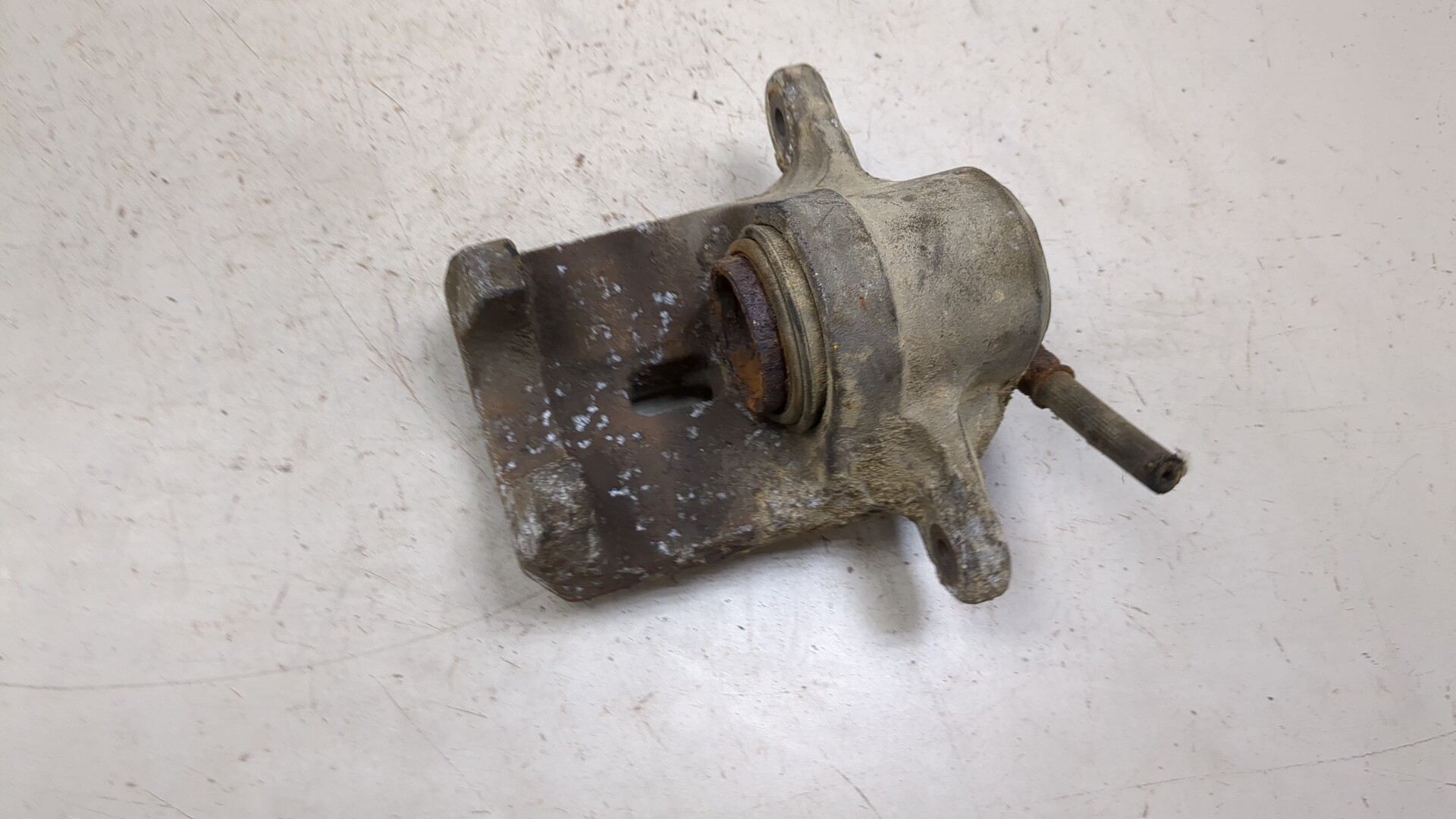 Суппорт задний левый