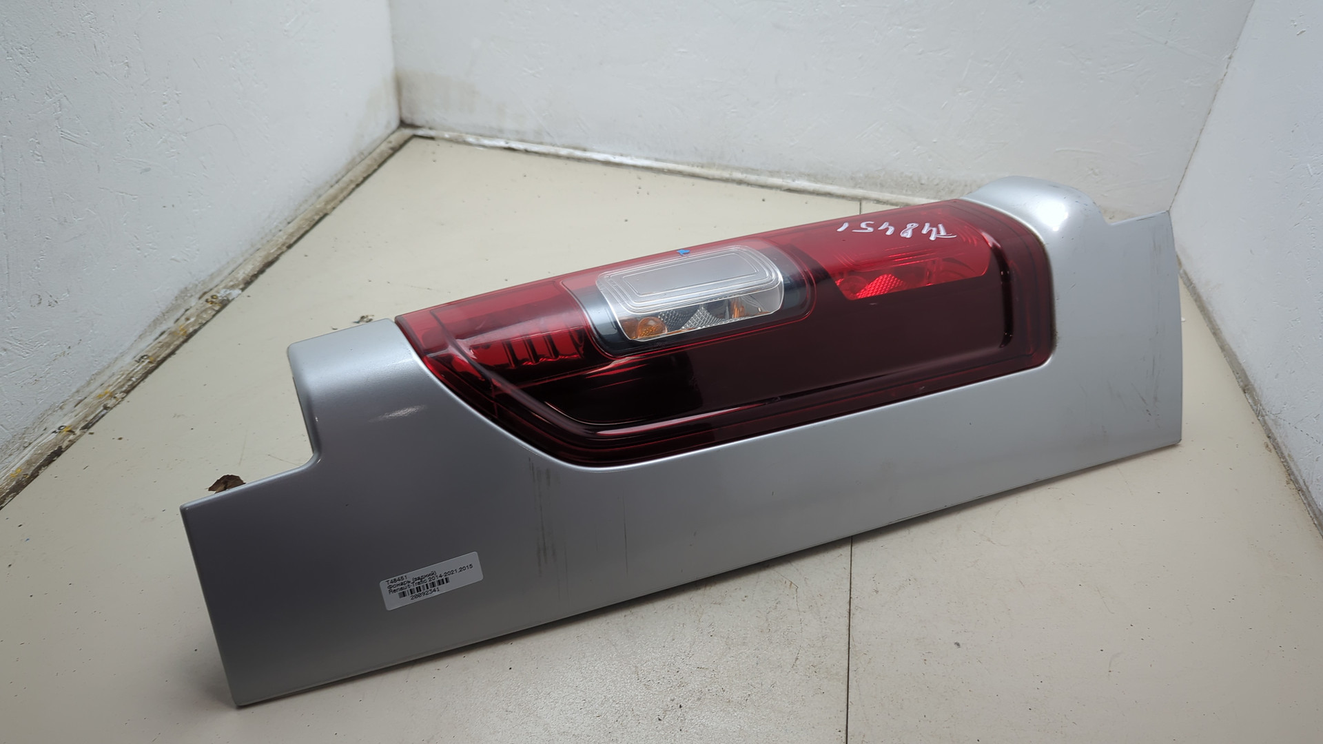 Фонарь задний левый