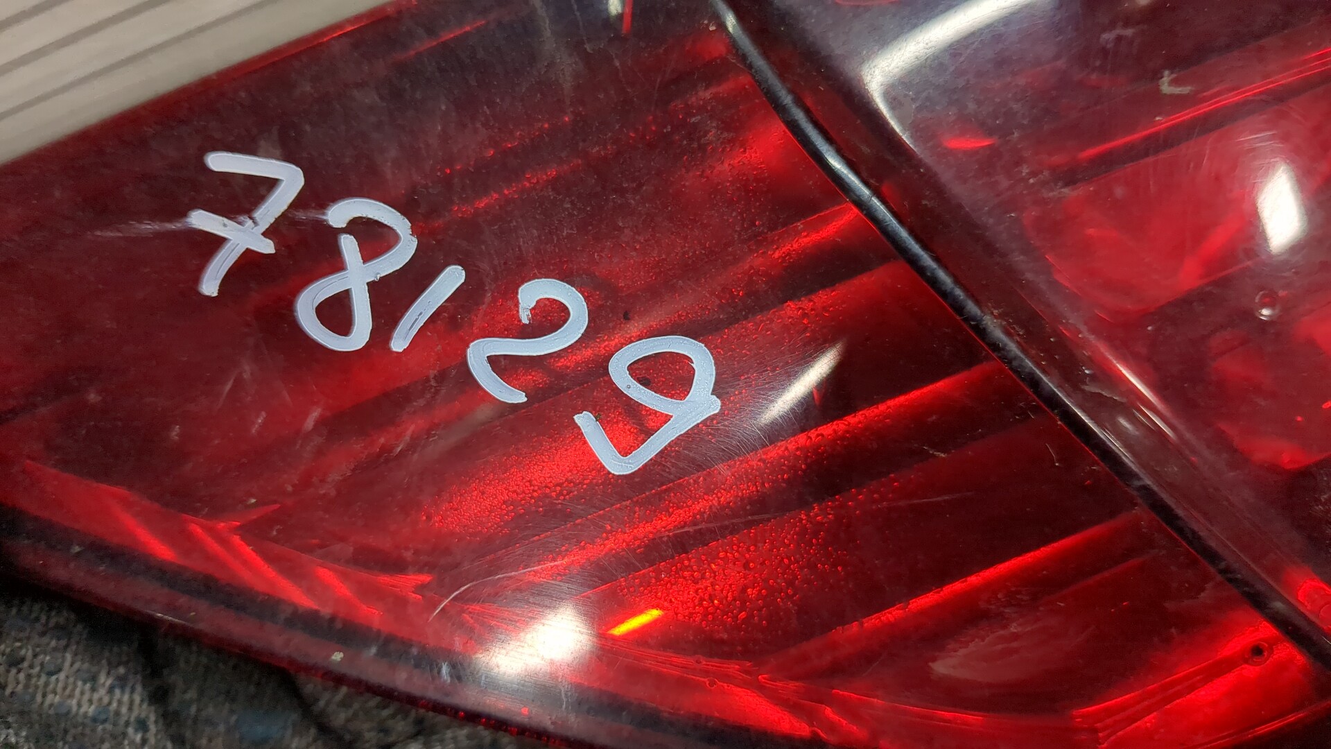 Фонарь задний левый