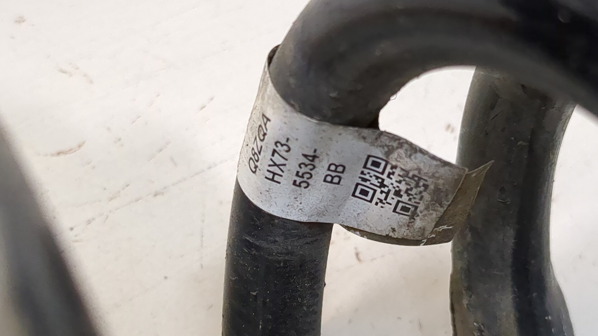 Пружина задняя