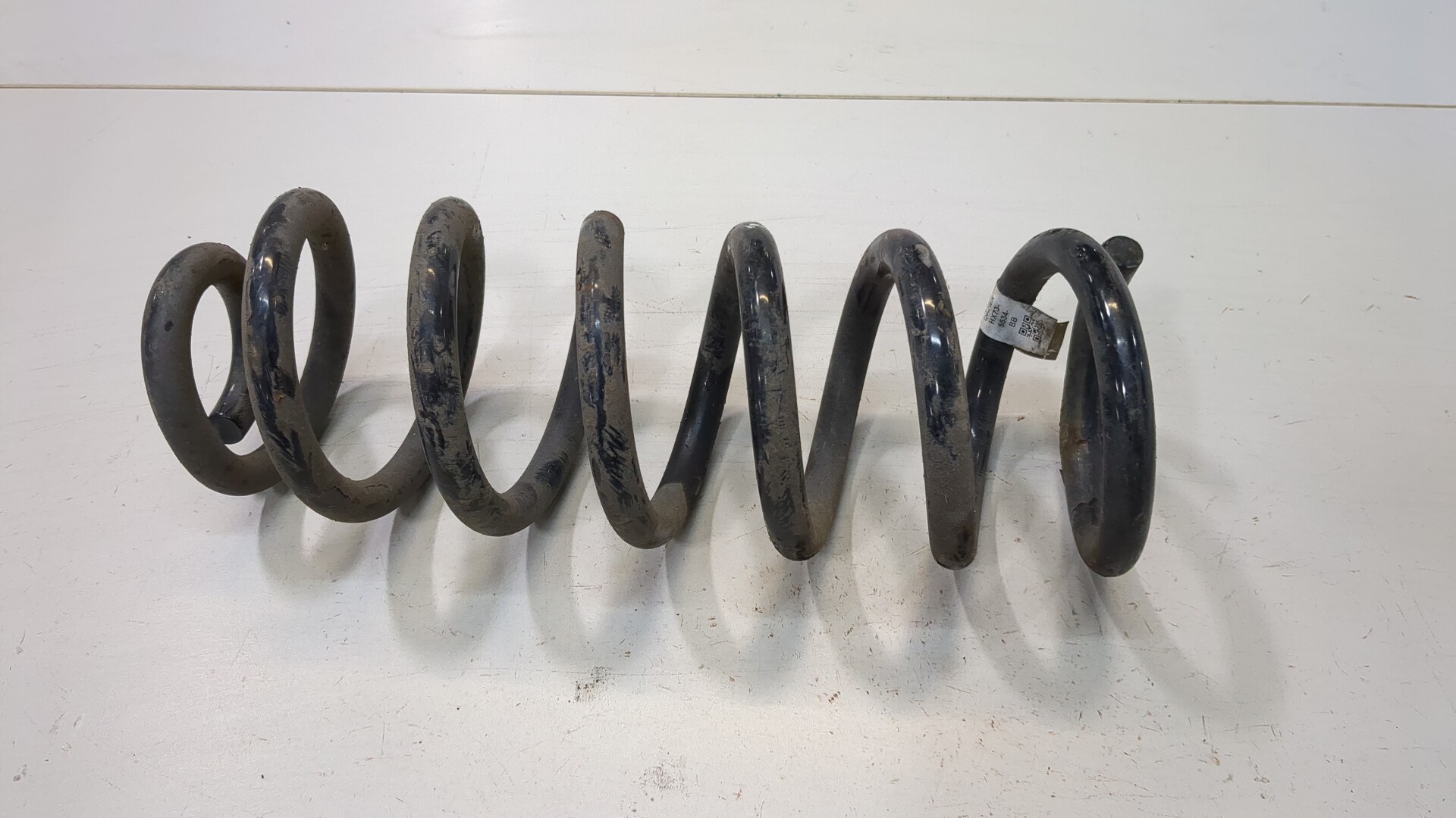 Пружина задняя