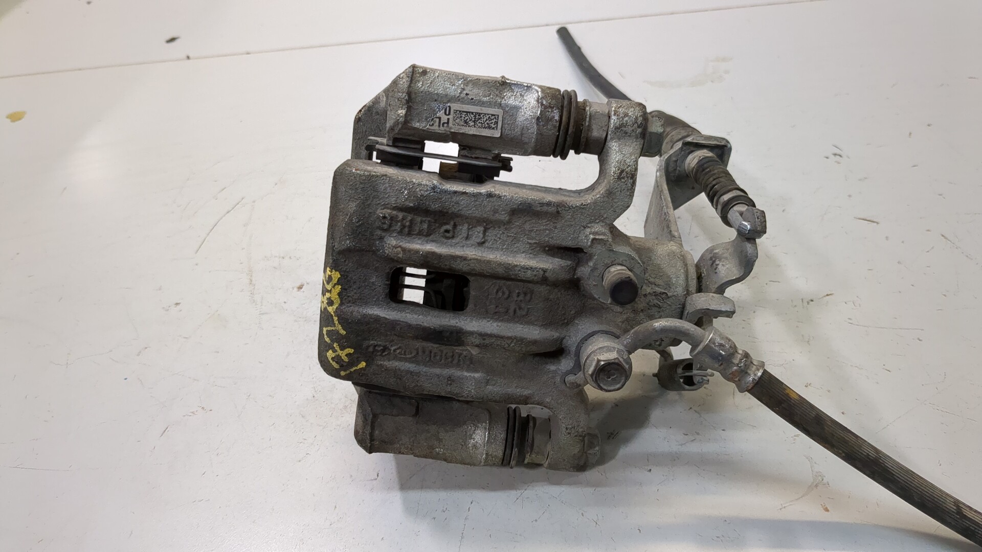 Суппорт задний левый