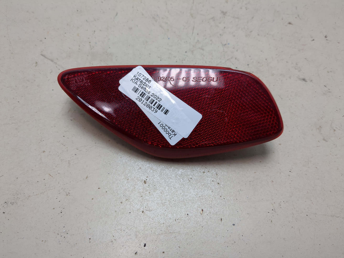 Отражатель в бампер задний левый